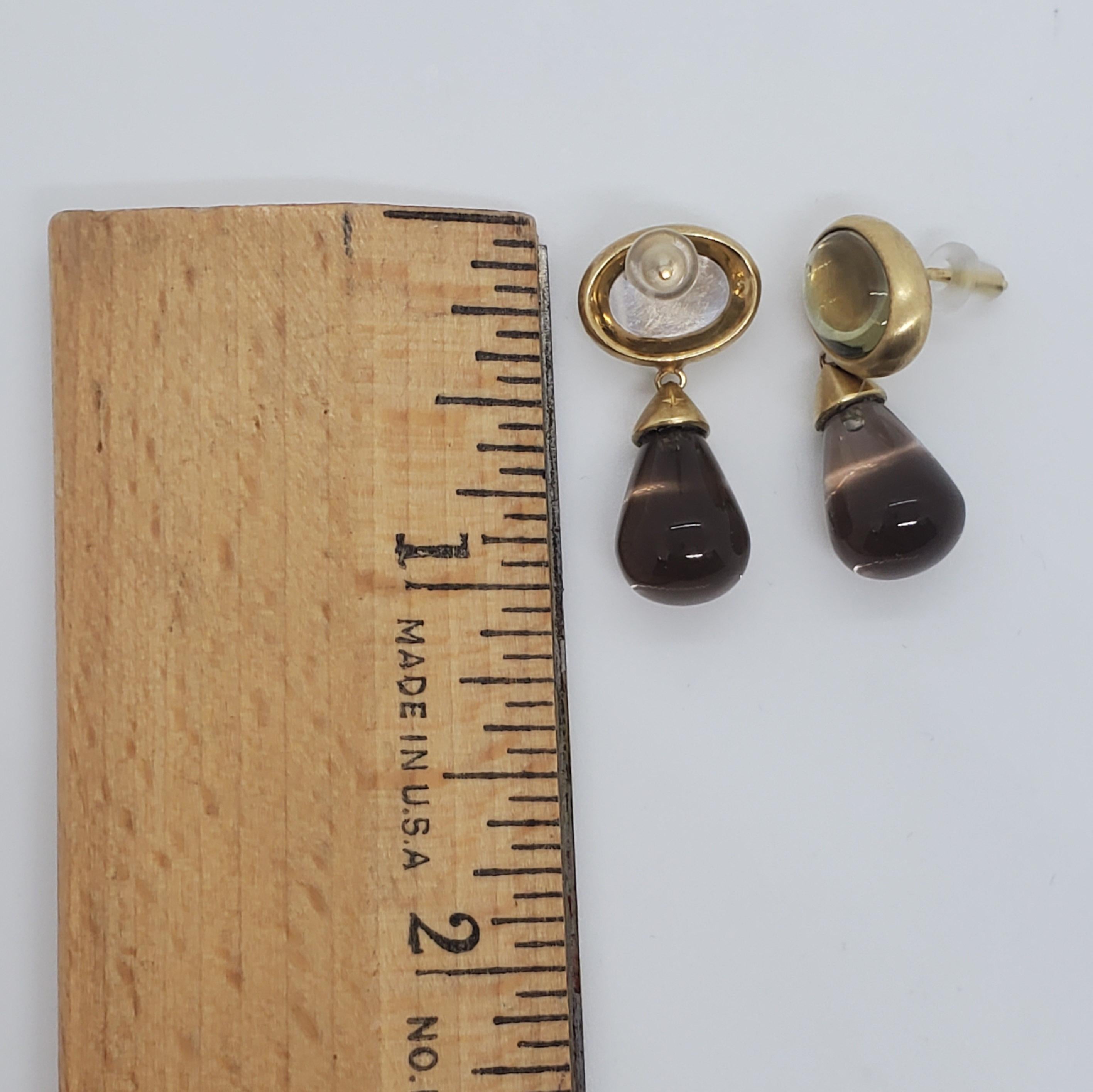 Beautiful smoky quartz drops with green oval stones in a handmade 18k yellow gold mounting.