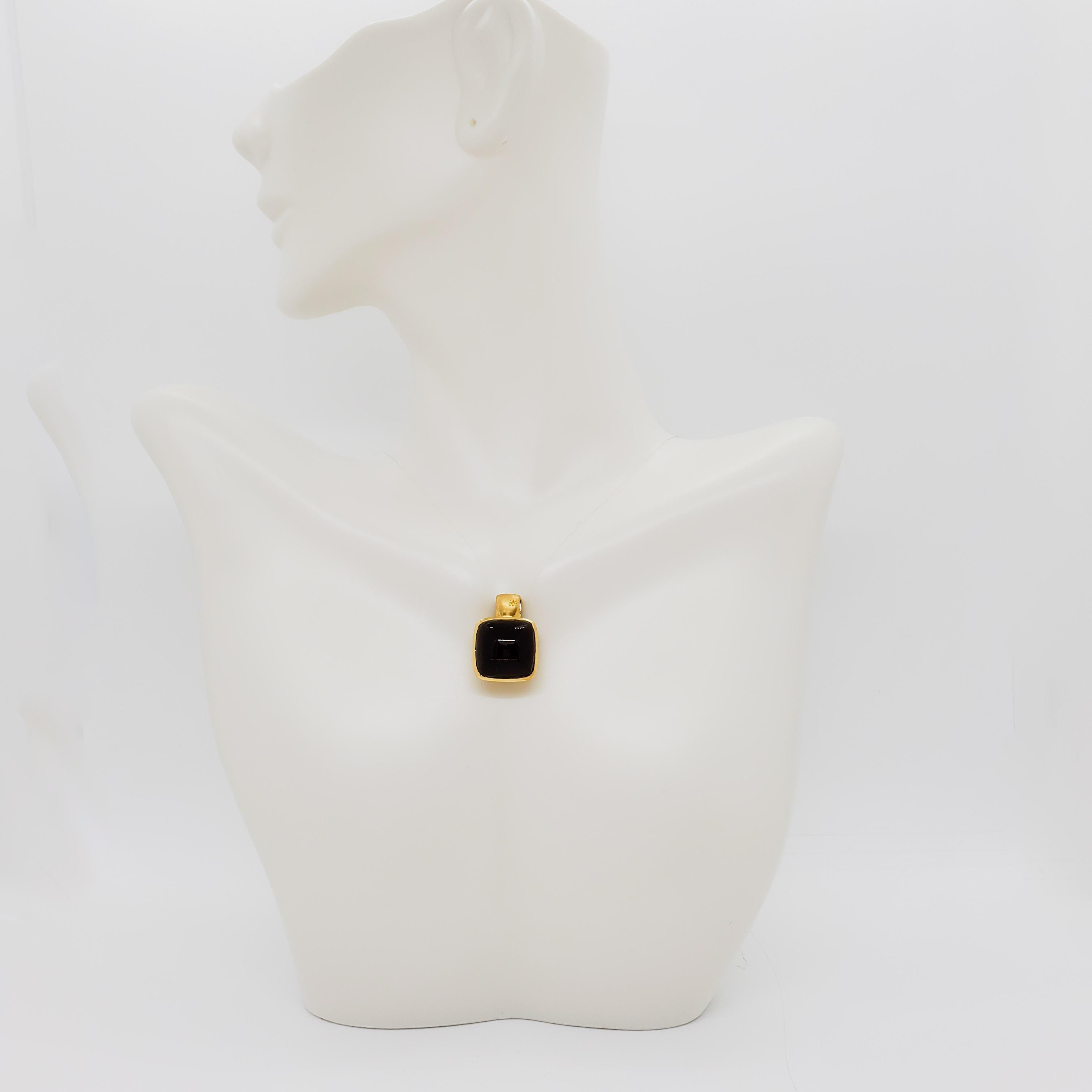 Beautiful H. Stern pendant with a 5.00 ct. smoky quartz square cabochon in a handmade 18k yellow gold mounting.  Chain is not included.