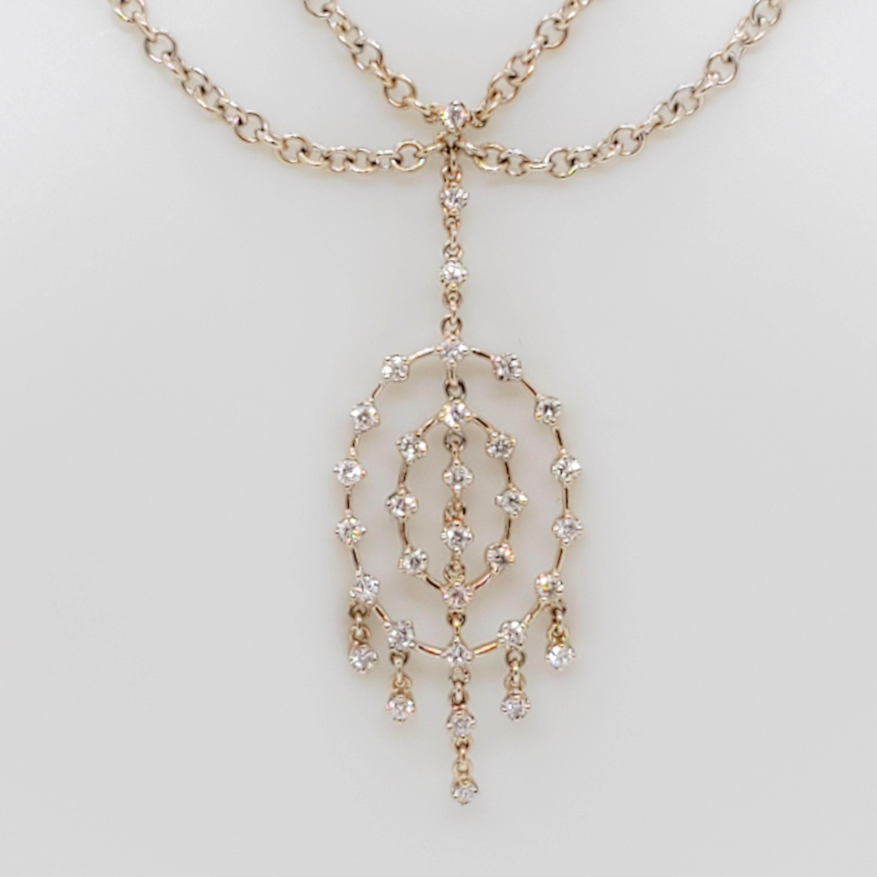 Beautiful H. Stern necklace with 0.40 ct. good quality white diamond rounds and multiple chains. Handmade in 18k yellow gold.