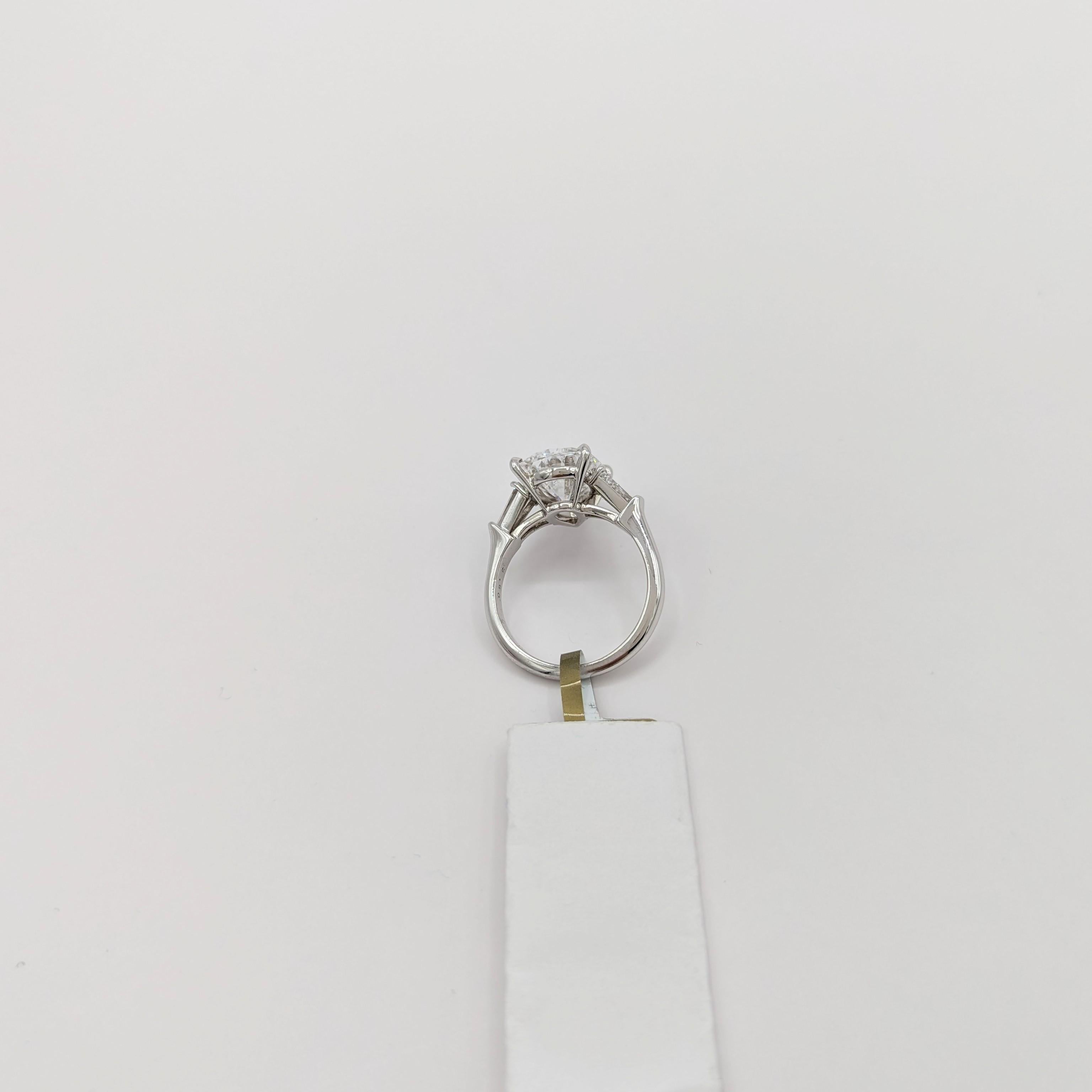 Estate Harry Winston GIA White Diamond Pear Three Stone Ring in Platinum In New Condition In Los Angeles, CA
