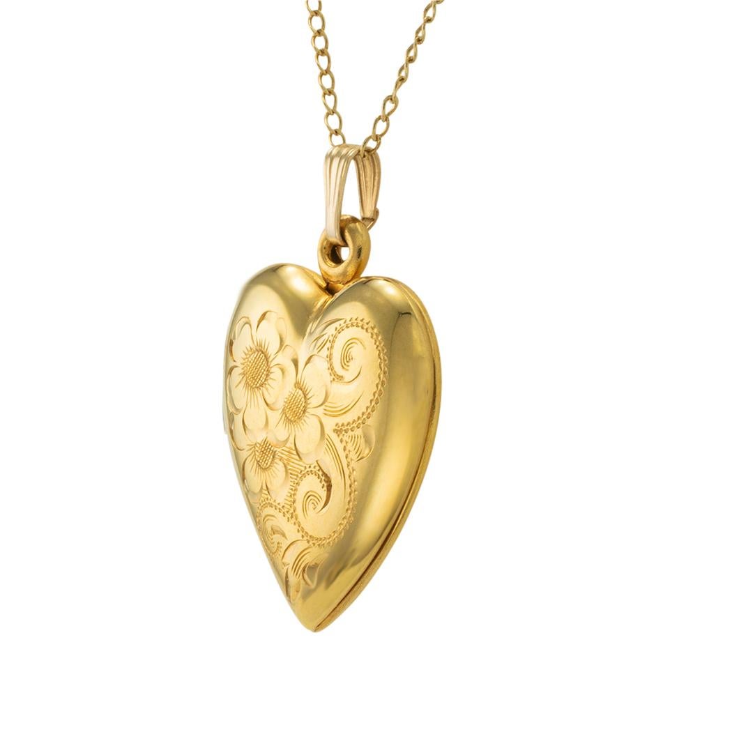 Estate heart-shaped yellow gold locket circa 2000. *

ABOUT THIS ITEM:  #P-DJ730E. Scroll down for detailed specifications.  This estate heart-shaped gold locket is in such good condition that it appears as if it was never worn.  The front is