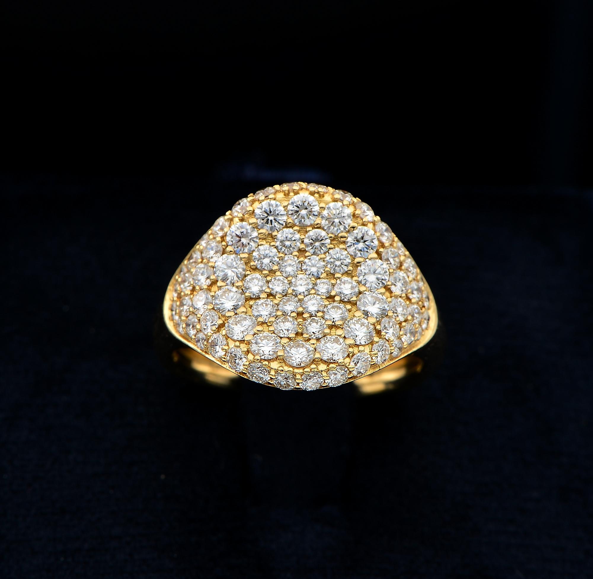 The Finest Jewellery
Highest in quality, contemporary, hand crafted of solid 18 KT gold, beautifully designed signet ring
Set throughout by a selection of F/VVS round brilliant cut Diamonds shooting white sparkle – 2.0 TCW
Tested for gold
