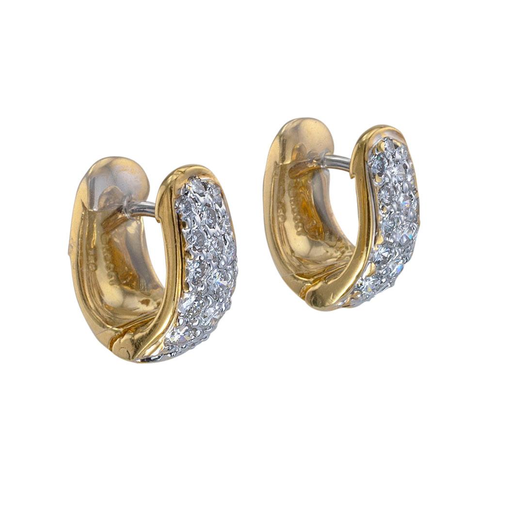 Estate Huggy diamond and yellow gold earrings.  Love them because they caught your eye, and we are here to connect you with beautiful and affordable jewelry.  Decorate Yourself with these small huggy hoops!   They can be worn 2 ways, all diamonds or