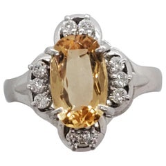 Estate Imperial Topaz Oval and Diamond Ring in Platinum