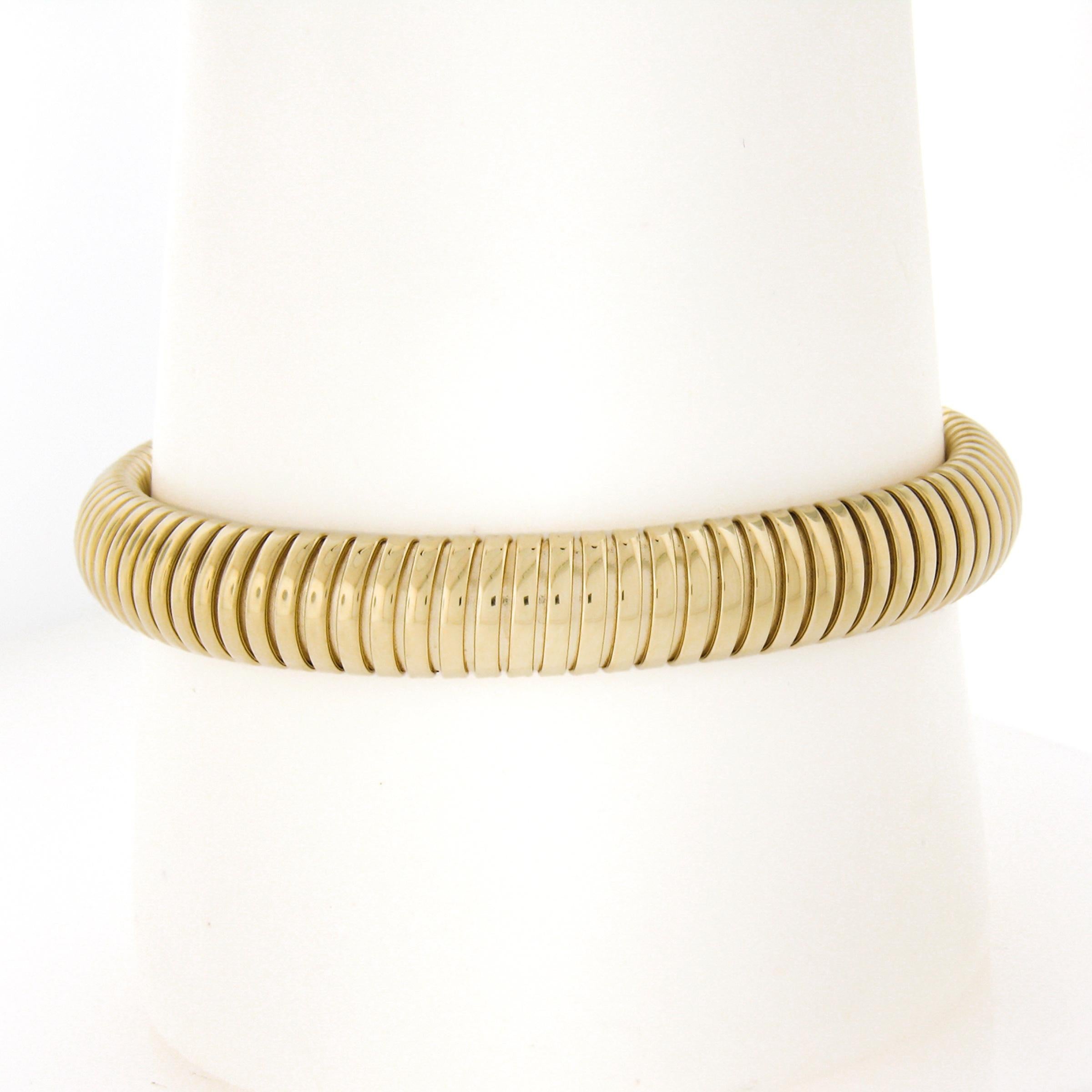 Material: Solid 14k Yellow Gold
Weight: 20.83 Grams
Chain Type: Accordion Snake Link Chains
Chain Length:	Will fit a 7 inch wrist. (Fitted on a wrist)
Chain Width: 9.3mm
Chain Thickness: 5.1mm rise off the wrist
Clasp: Push clasp
Condition: Estate.