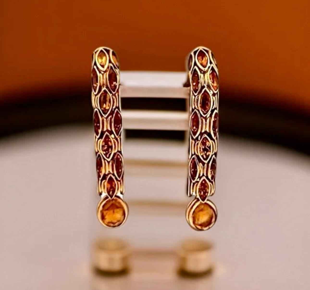 From a distinguished Italian designer atelier, these estate drop earrings showcase 12.00 cttw of luminous citrine, each stone expertly cut to capture exceptional light and warmth. Crafted in 18K yellow gold, they embody the effortless sophistication