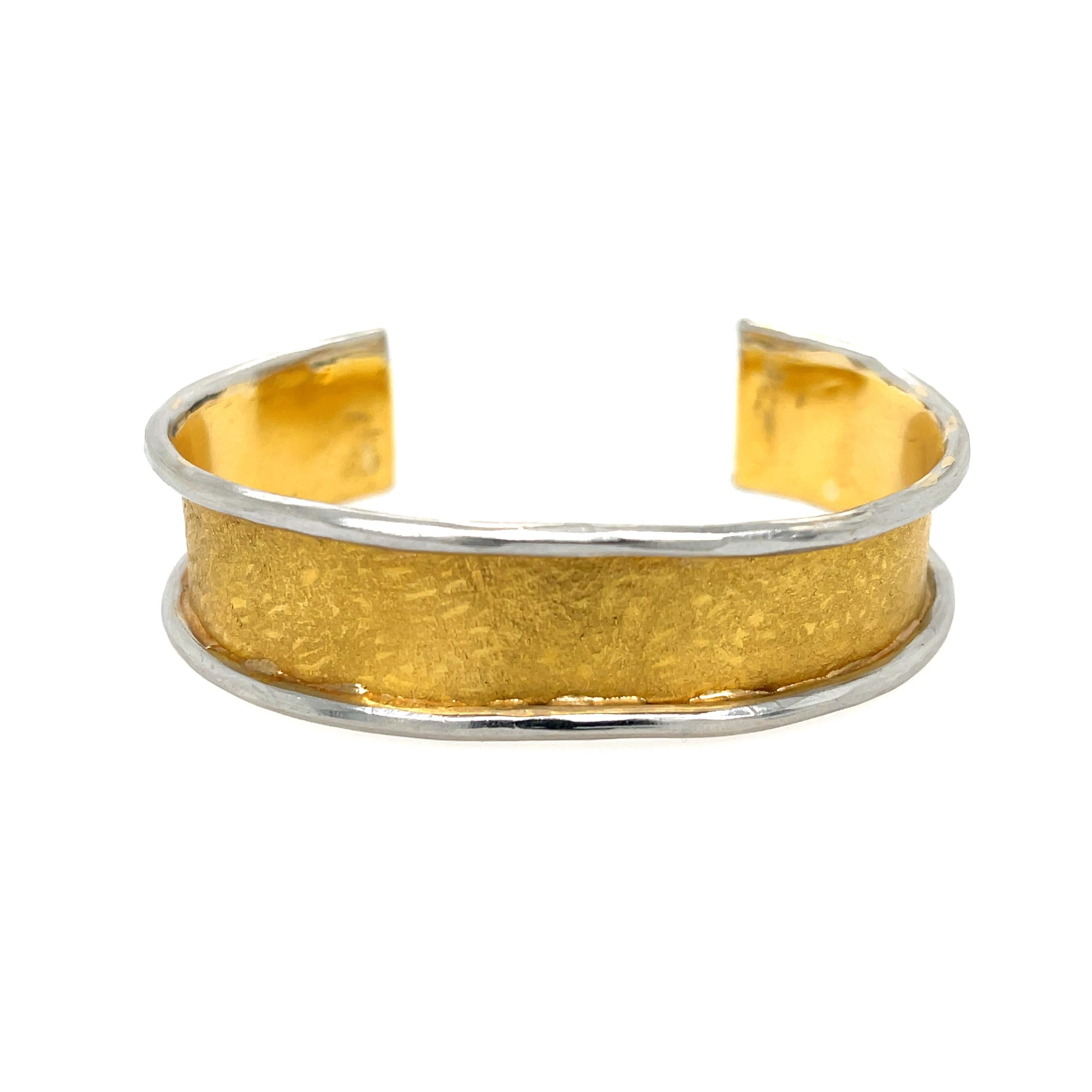 Estate Jean Mahie Cuff in Platinum and 22K Yellow Gold. 
43.8 grams 
2.25