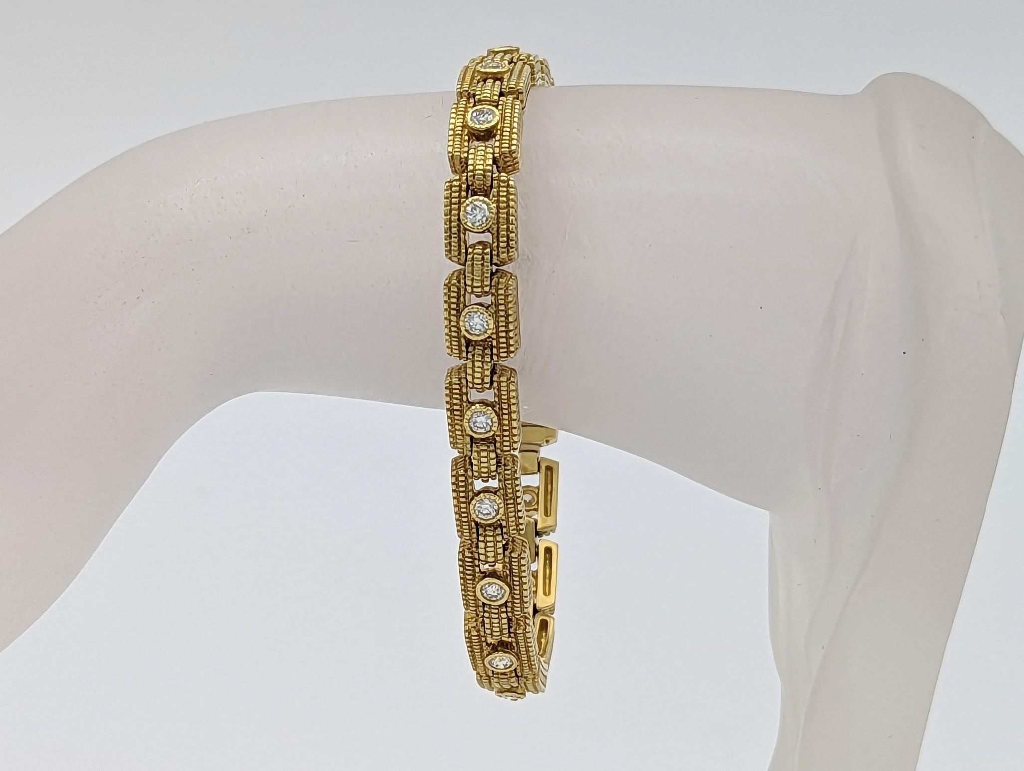 Beautiful Judith Ripka bracelet with 1.03 ct. good quality white diamond rounds and 18k yellow gold.  Handmade and length is 7.25