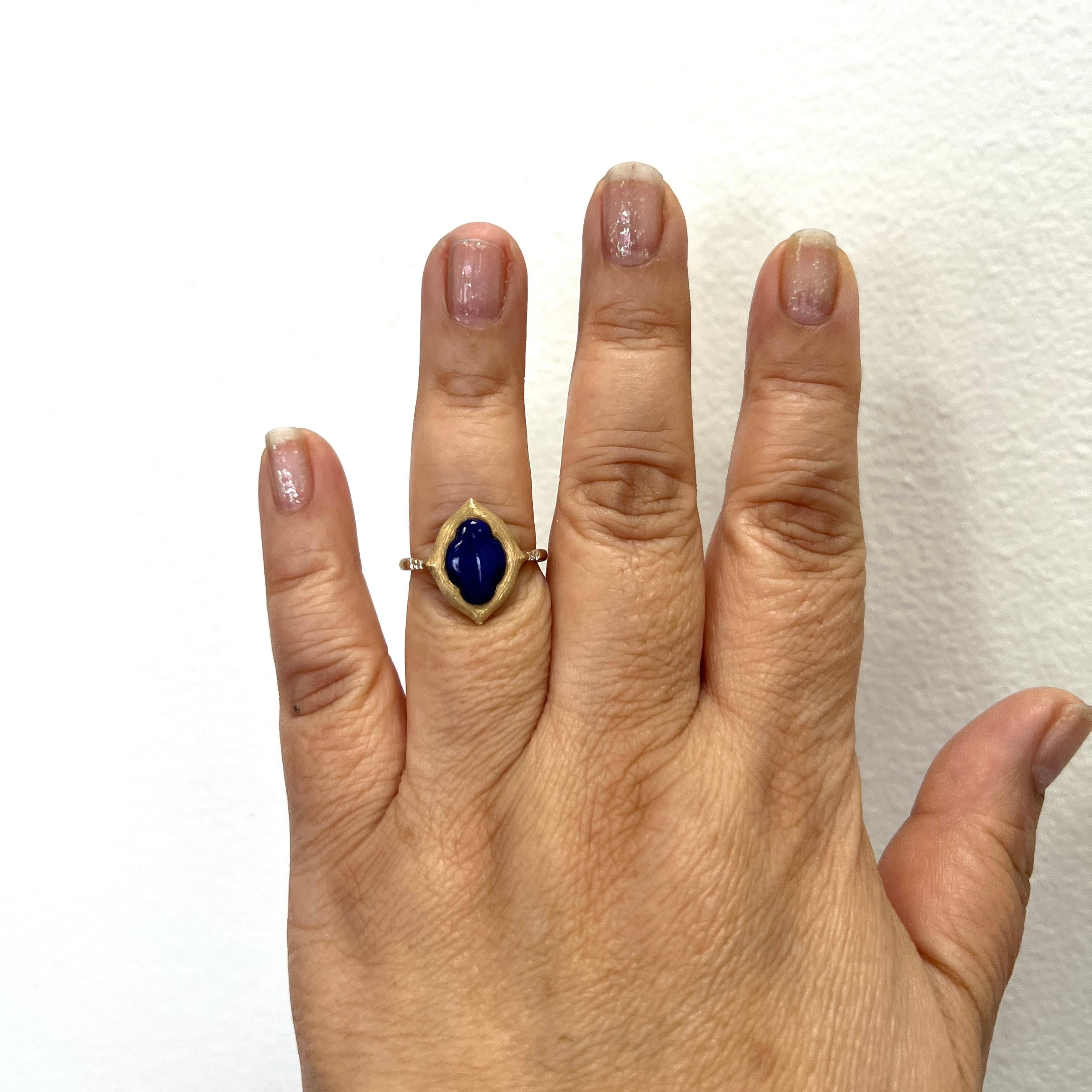 Beautiful Kabana lapis lazuli and 0.07 ct. white diamond ring.  Handmade in 14k yellow gold.  Ring size 8.