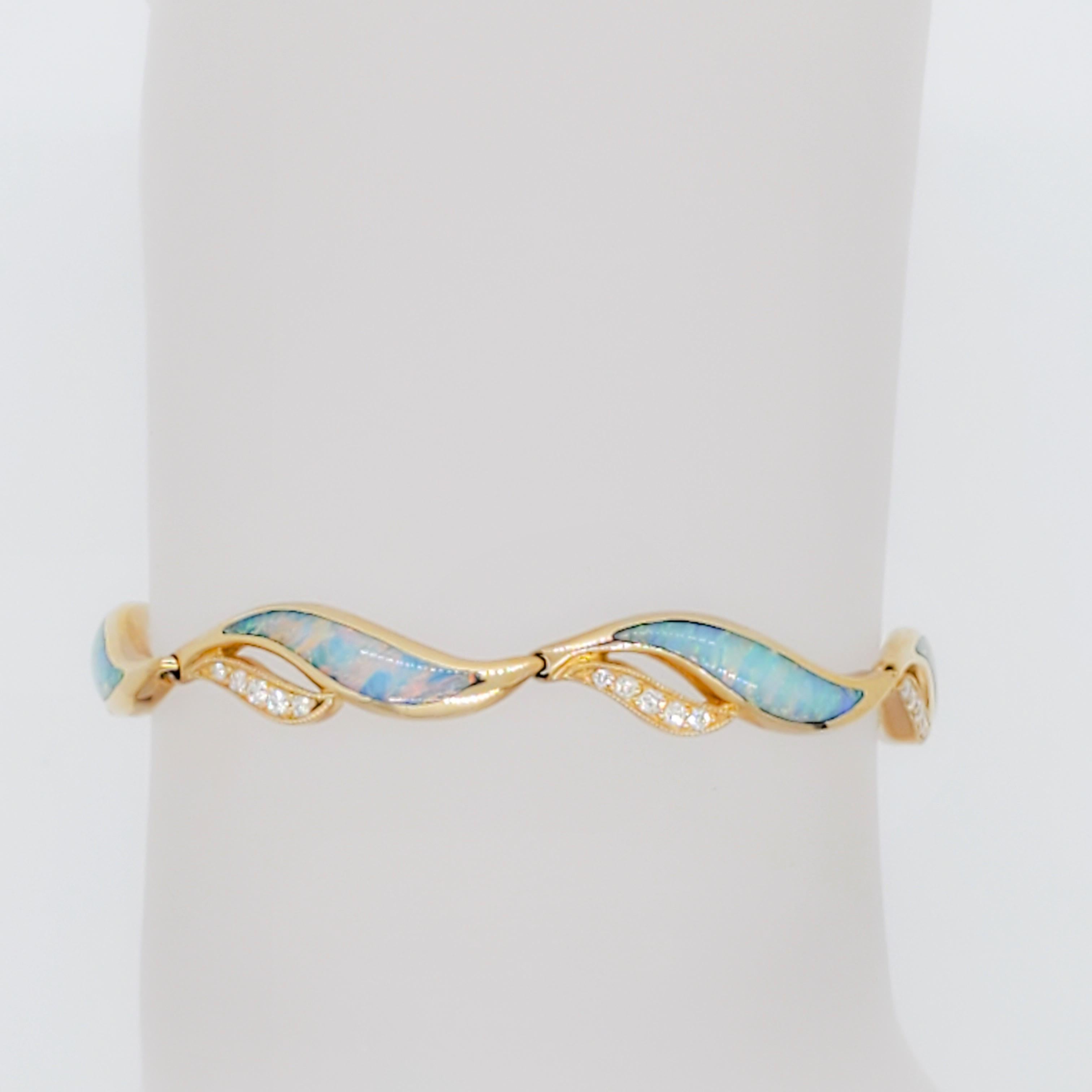 Beautiful Kabana bracelet with fancy shape opals and 0.38 ct. good quality white diamond rounds.  Handmade in 14k yellow gold.  Length is 15