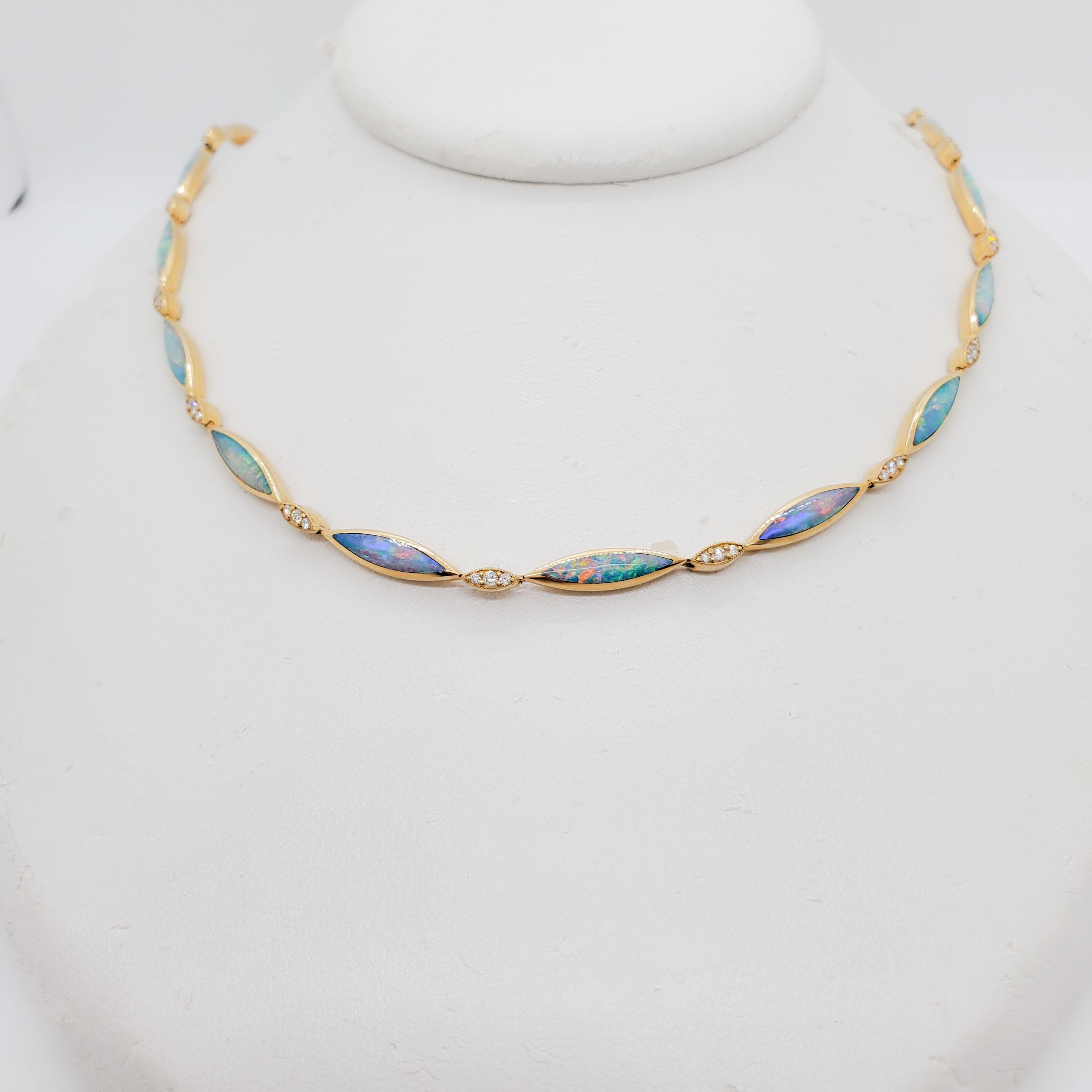 Beautiful Kabana necklace with opal marquise shapes and 0.62 ct. of good quality white diamond rounds.  Handmade in the USA in 14k yellow gold.  Length is 18