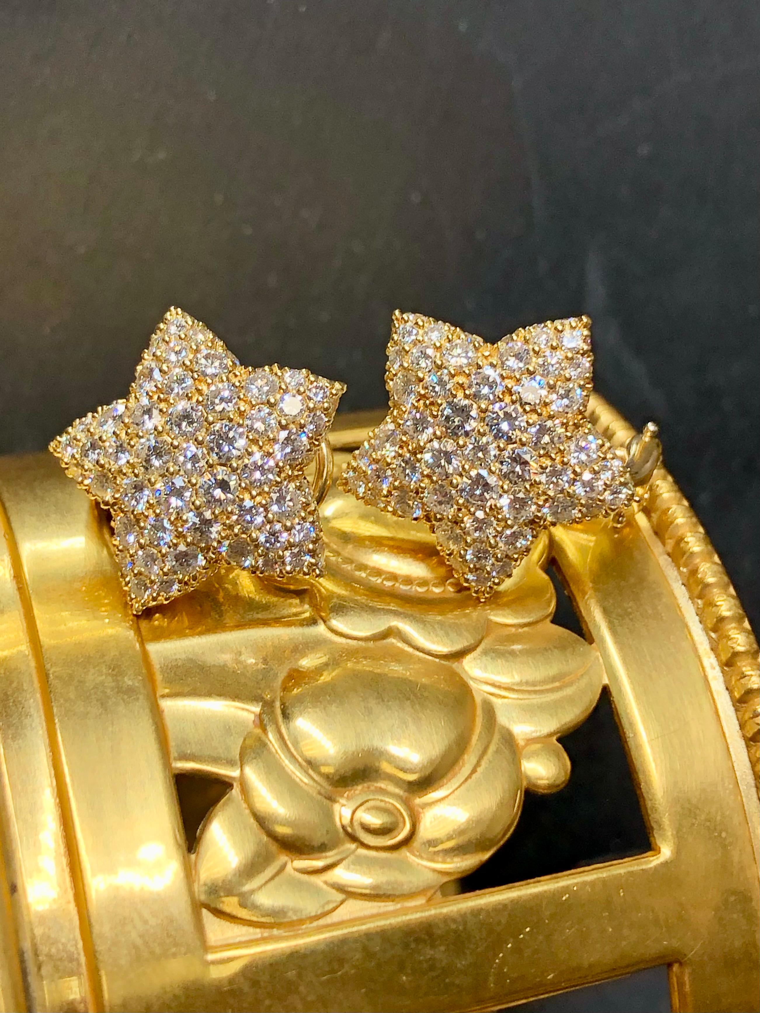 
Stunning… stunning stunning stunning! These earrings are by none other than famous Austrian jewelry designer, Kurt Wayne. They are done in 18K yellow gold and set with approximately 5cttw in absolutely top quality matching round diamonds. All