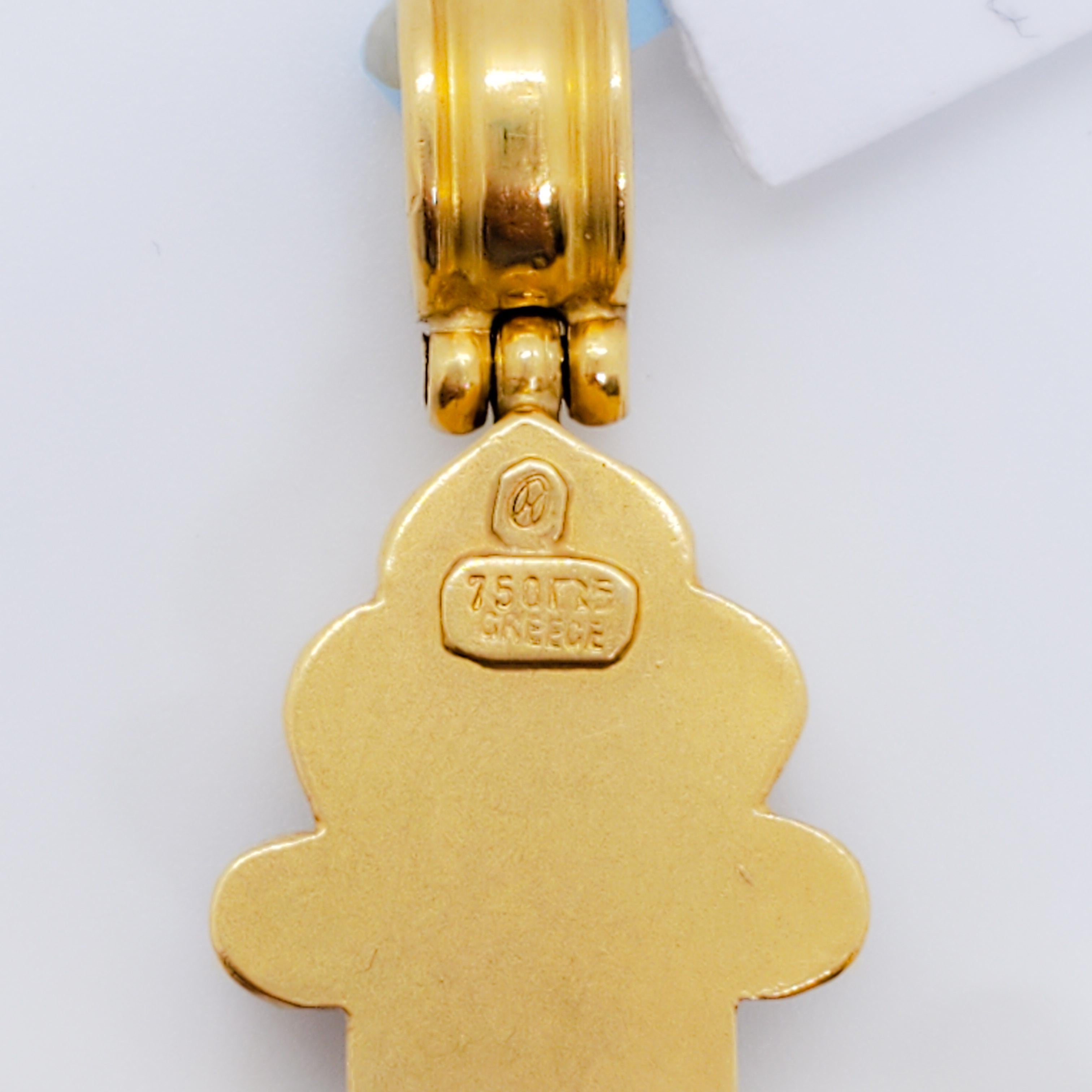 Beautiful and classic estate Lalaounis blue enamel cross in 18k yellow gold.  Very rare and hard to find.  This pendant has a substantial weight and size to it.  Mint condition.