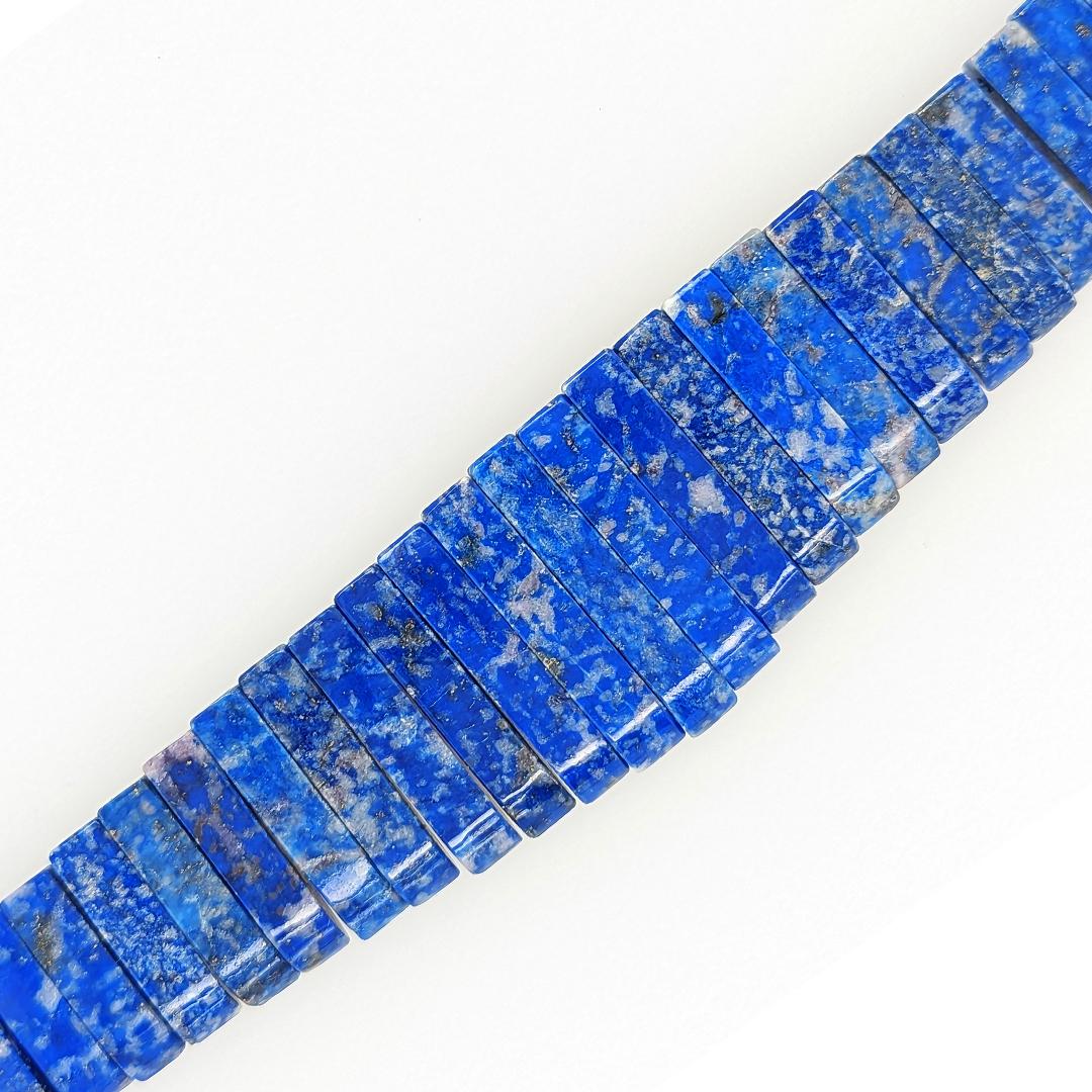 This Lapis Lazuli and yellow gold collar is made for royalty! Lapis lazuli has been loved by humans for over 6,500 years in Mesopotamia, Egypt, Greece, China, and Rome. When you see this beautiful color and pyrite marbling, it makes sense why! This