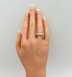 Anello Estate Lugano con diamante bianco taglio smeraldo e fascia East West in oro bianco 18 carati