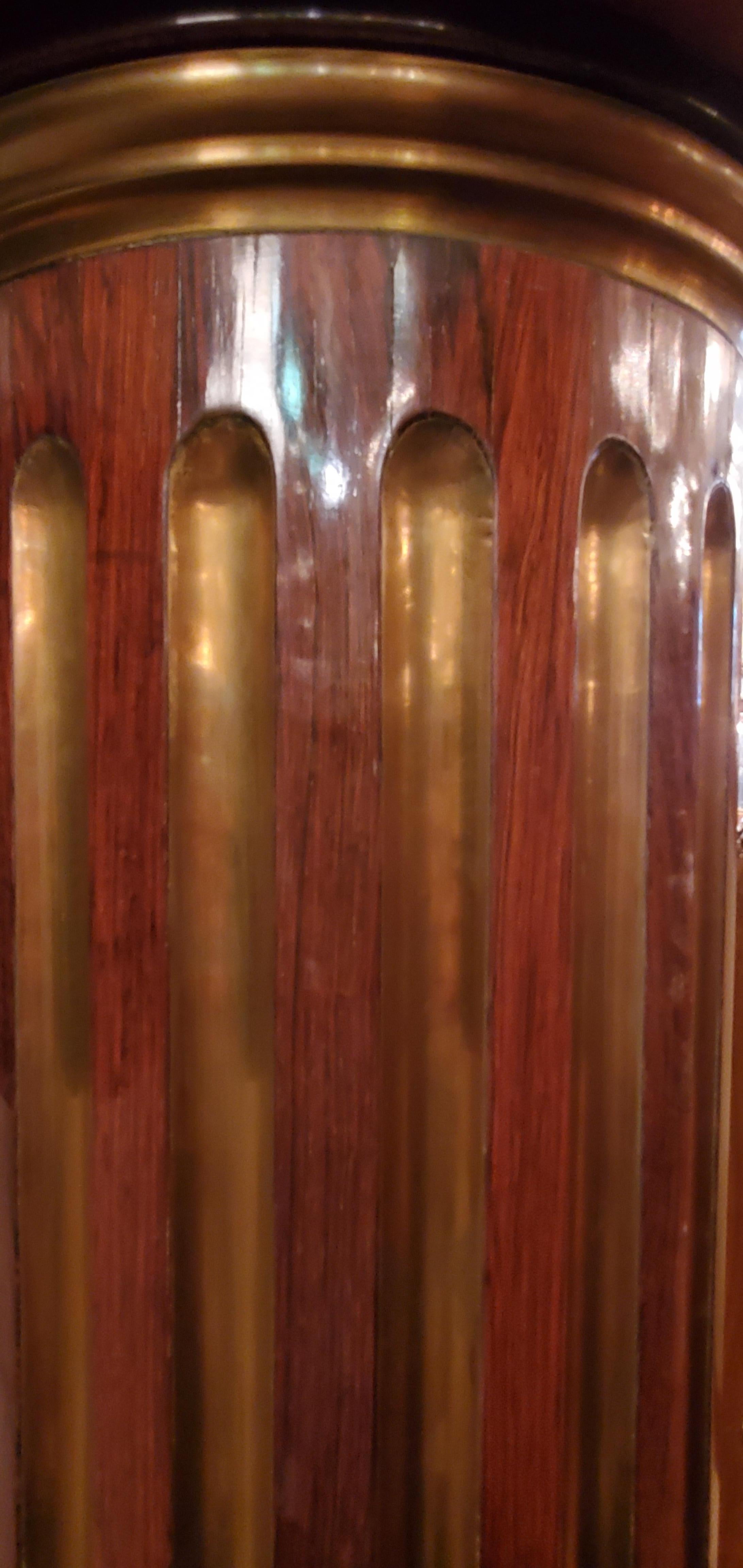 Estate mahogany and brass pedestal.