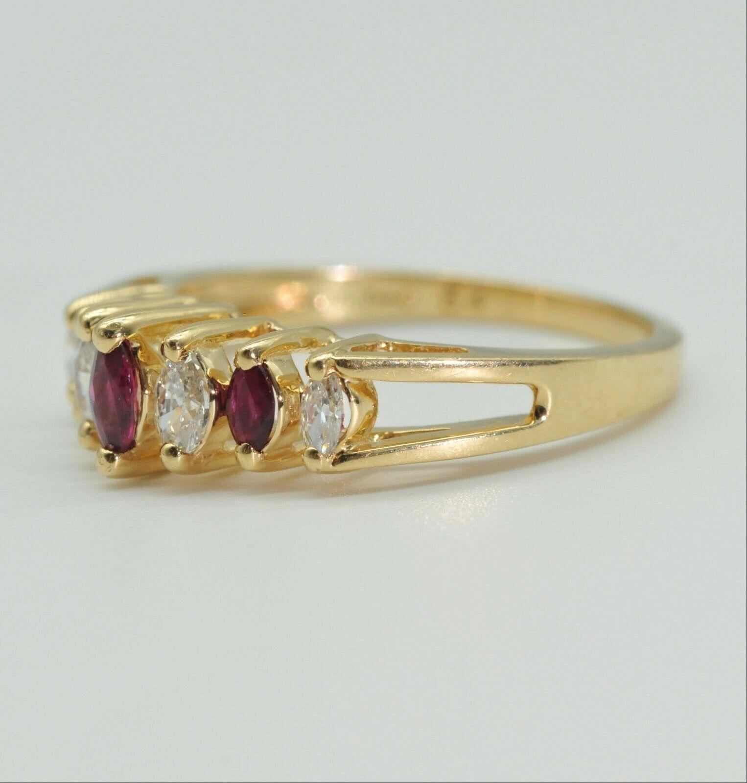 Contemporary Estate Marquise Diamond and Ruby Ring in 14k Yellow Gold For Sale