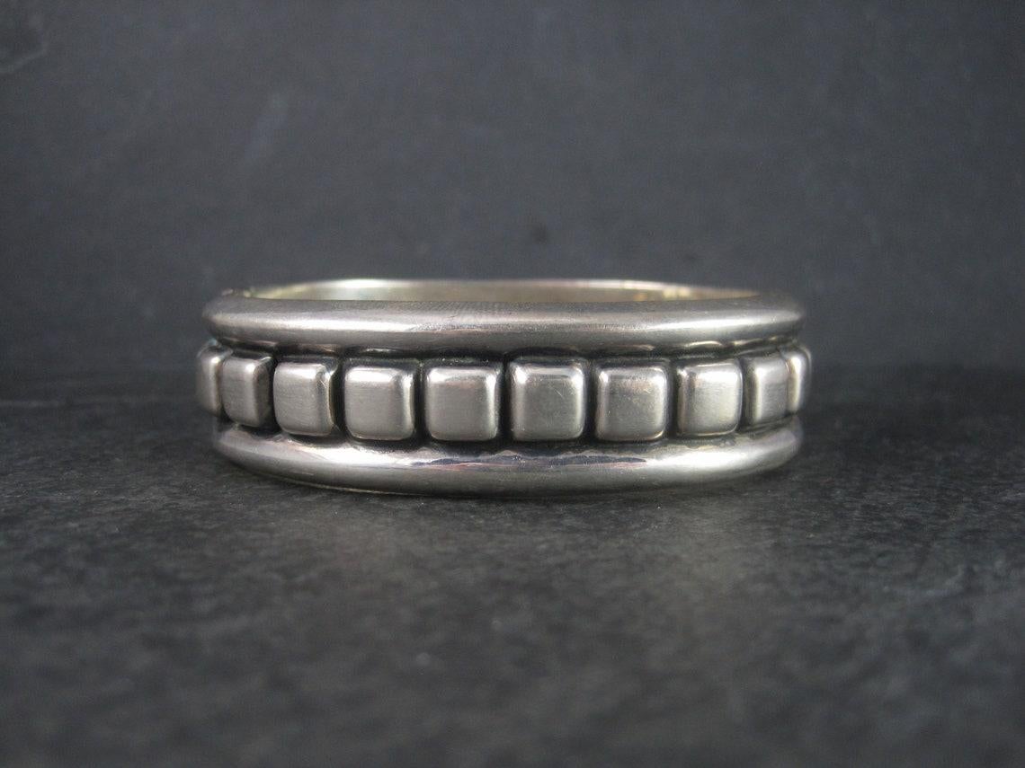 This gorgeous vintage Mexican clamper bracelet is sterling silver.

Measurements: 3/4 of an inch wide, Inner circumference of 6 3/4 inches
Weight: 58.3 grams

Marks: ATI, Mexico, 925

Condition: Excellent