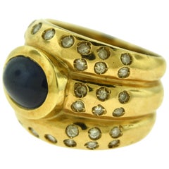 Estate Midnight Blue Sapphire and Diamond in 18 Karat Yellow Gold Ring