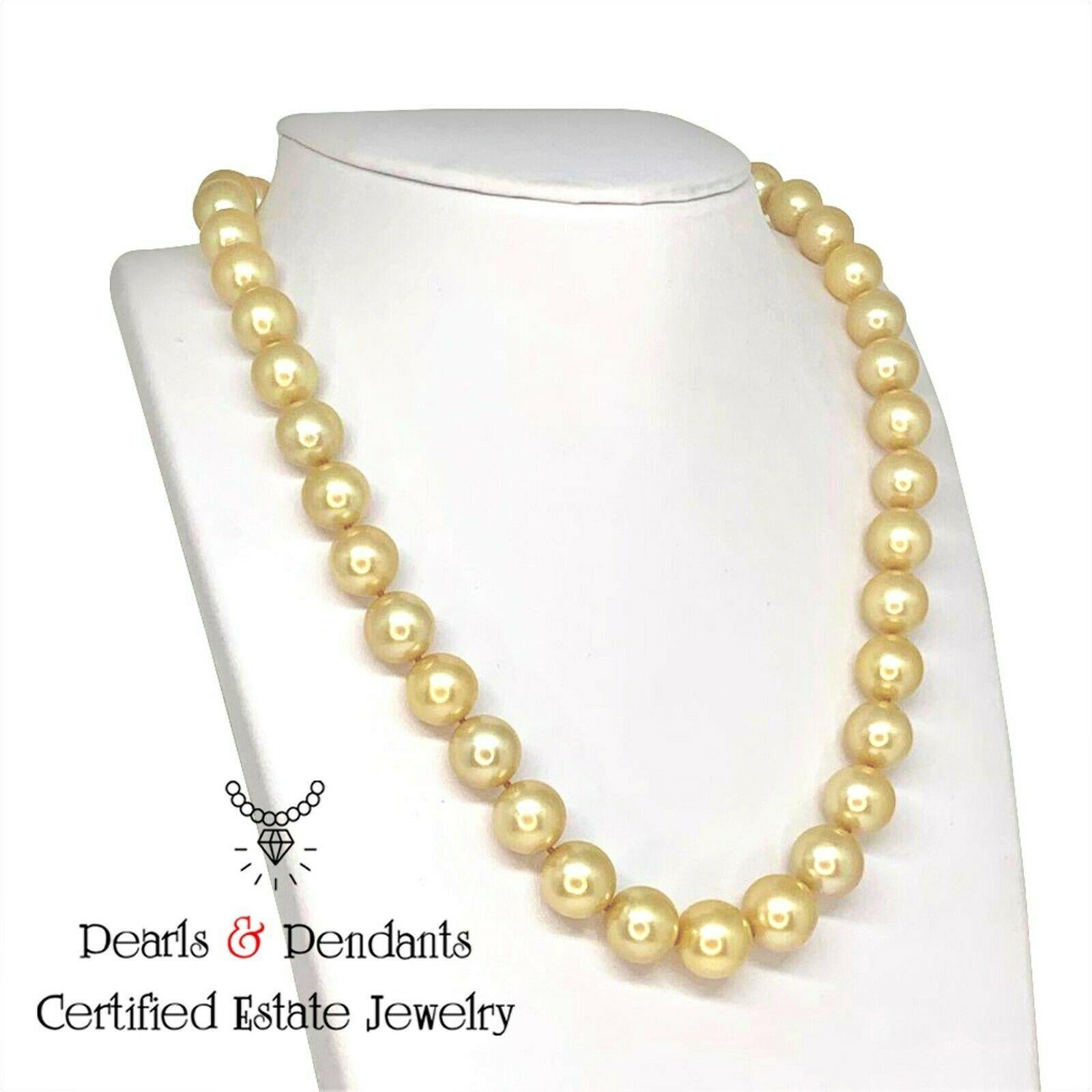 Estate Mikimoto South Sea Golden 39 LARGE Pearls 12.00-9.90 mm 18 Inch 18 KT Gold Clasp

Nothing says, 