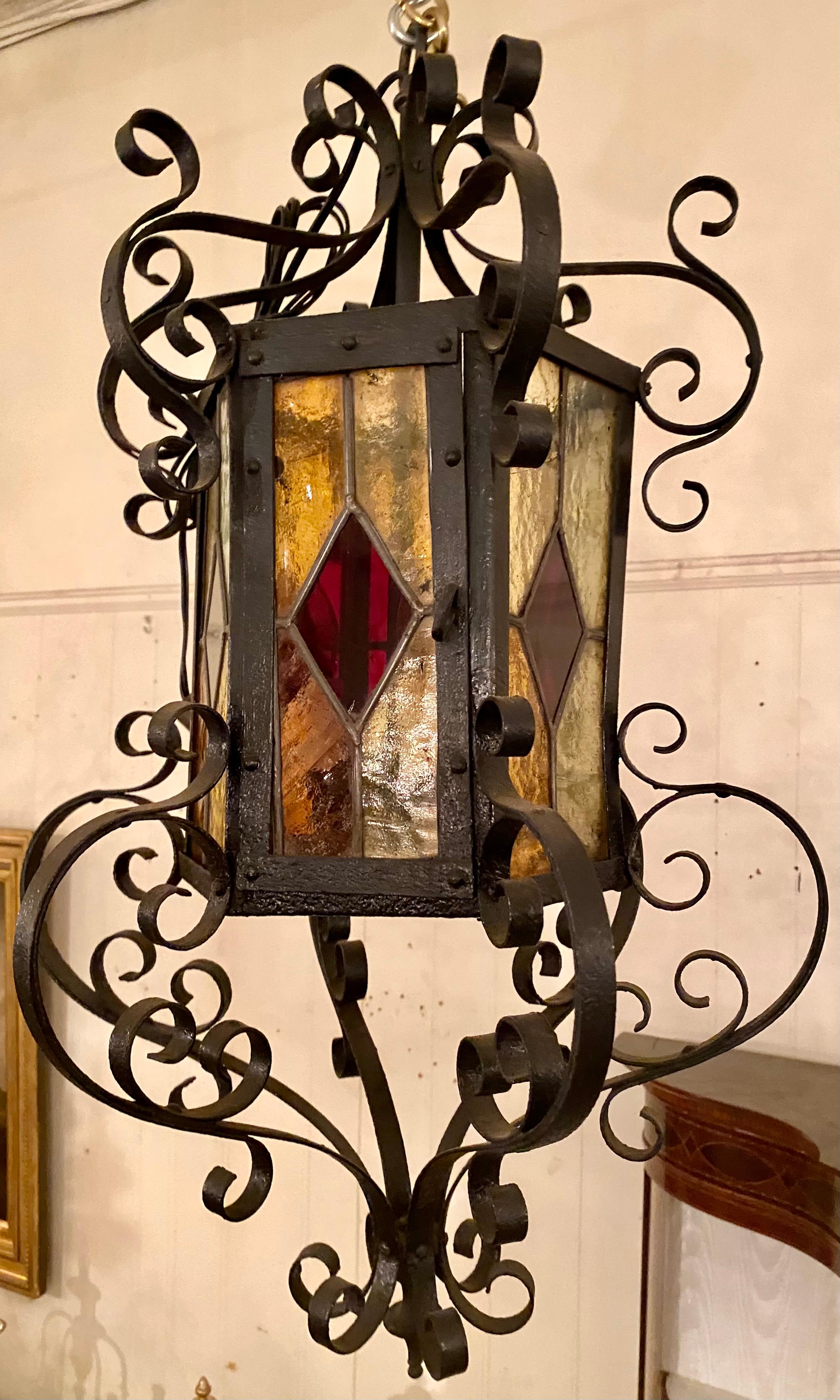 Estate multicolored glass wrought iron lantern.
LAN102.