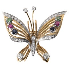 Broche de mariposa de piedras preciosas y diamantes de oro bicolor de 14 quilates
