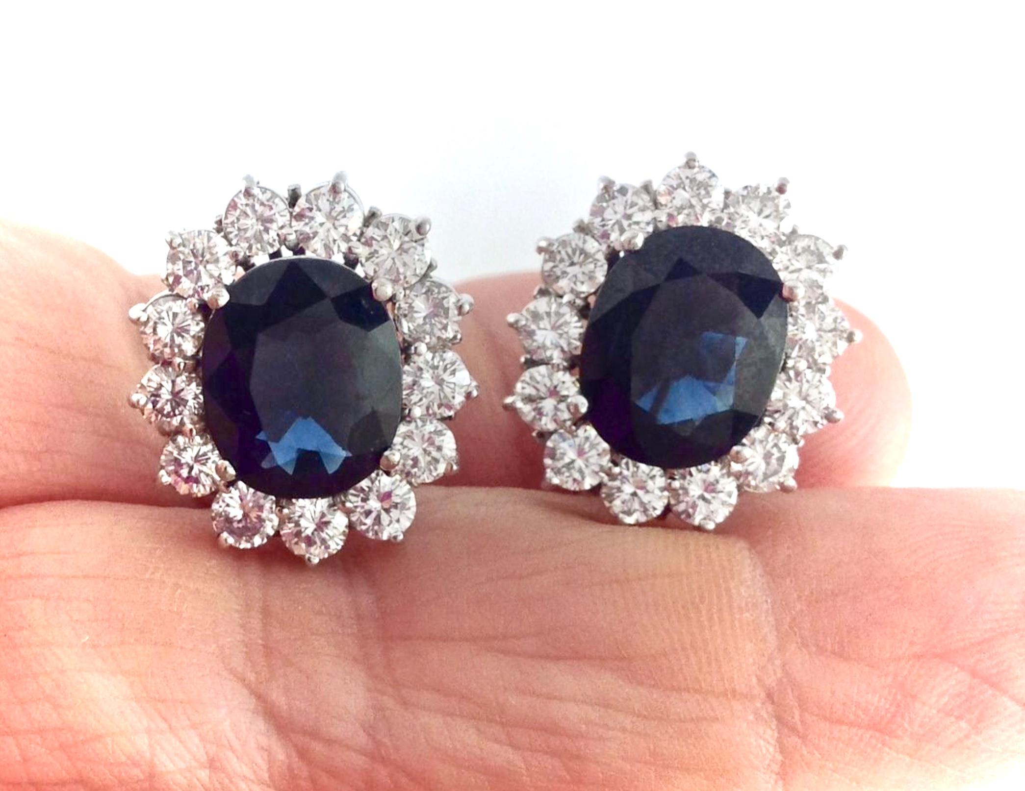 Timeless Natural Blue Sapphire & Diamond Estate Clip-on Earrings 18K White Gold
These gorgeous estate earrings are centered with two natural oval cut deep blue sapphires, VS clarity, weighing approx. 10.00 carats, surrounded by 4.00 carats diamond