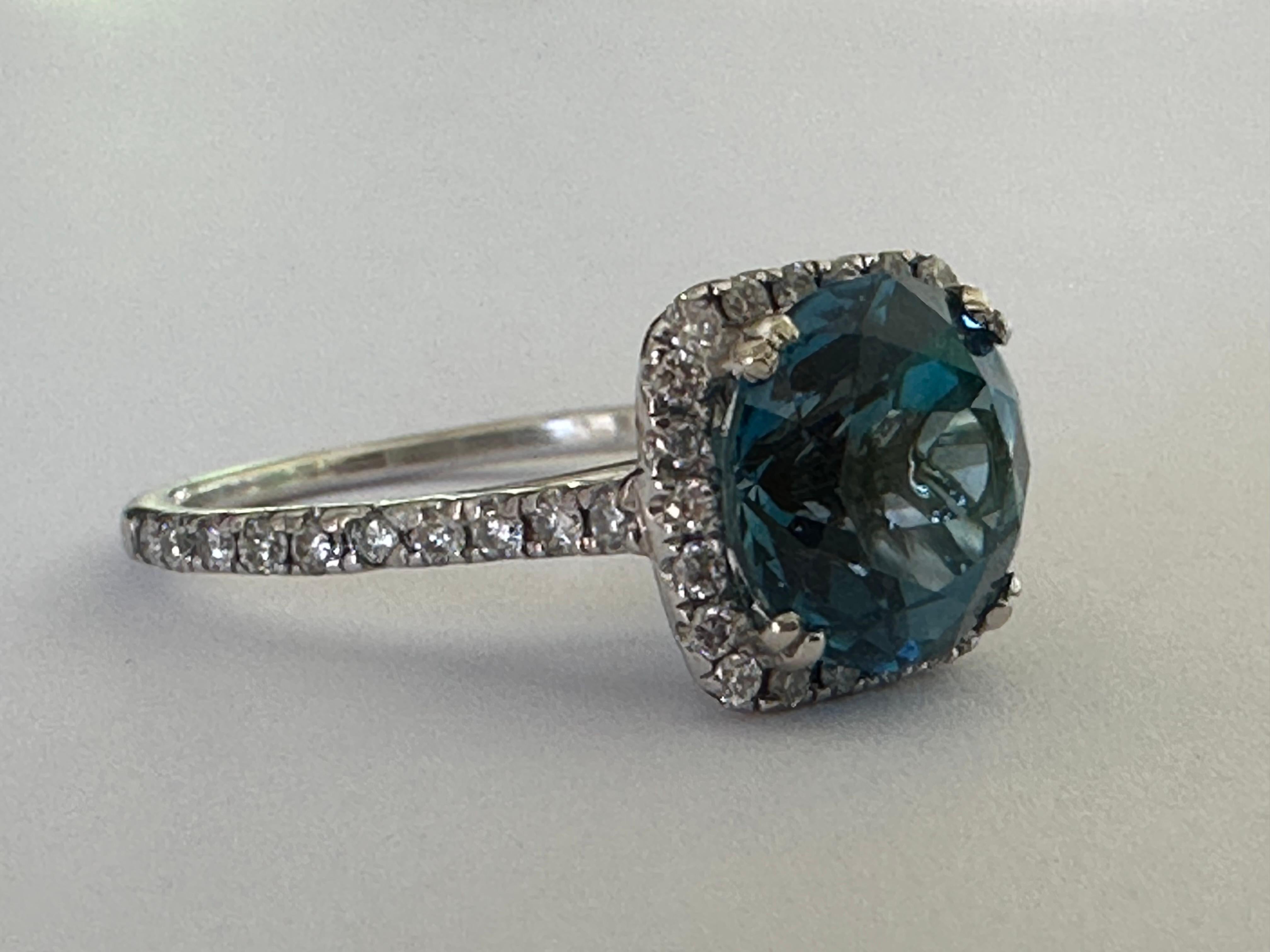 Round Cut Estate Natural Blue Topaz and Diamond Halo Ring For Sale