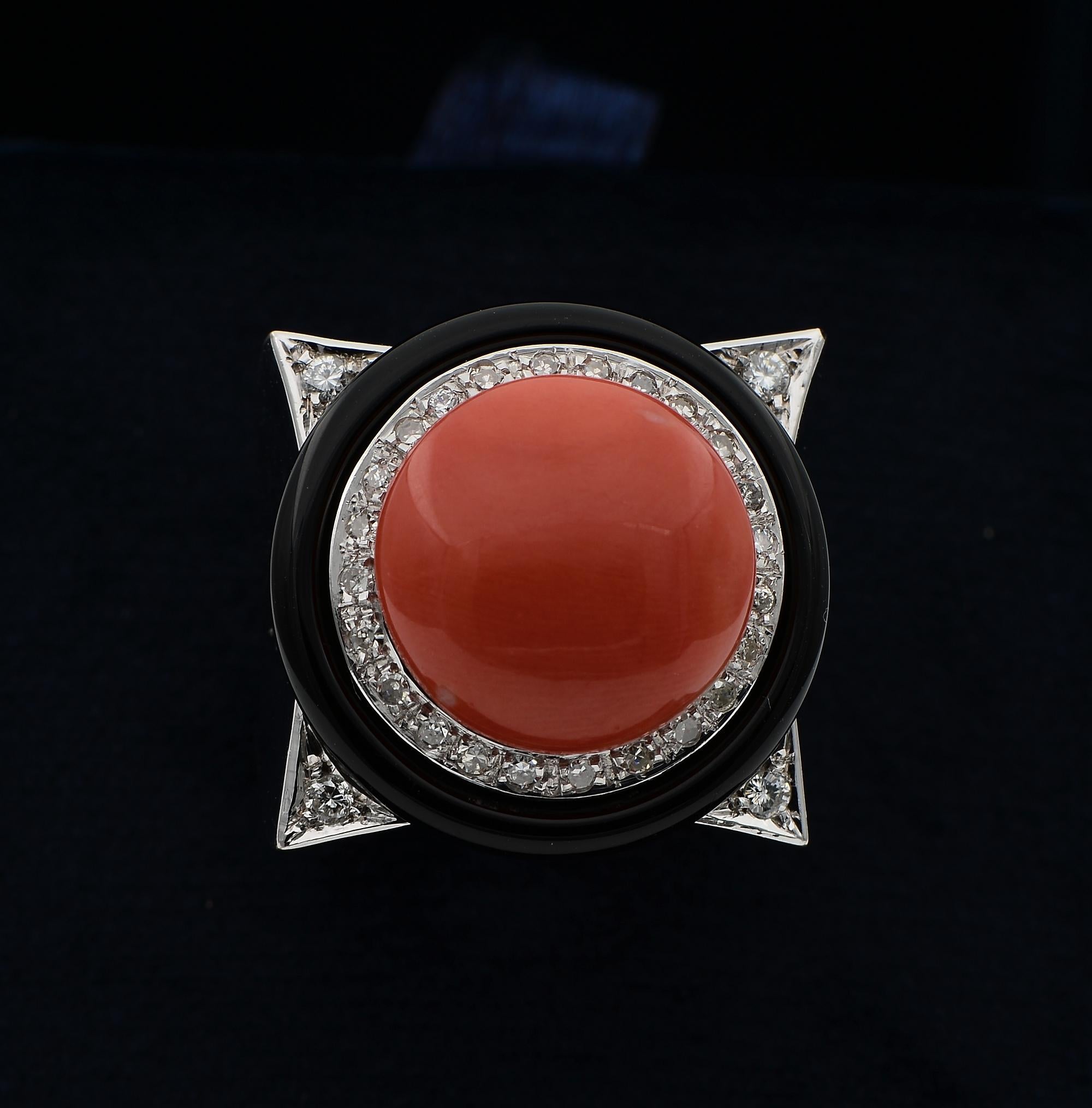 Ultra Chic
The most beloved combination between Black Onyx Diamond and warm Coral colour comes in this artful combination hand created in shining 18 Kt white gold (marked), strikingly dramatic in design
The squarish crown is set with a round
