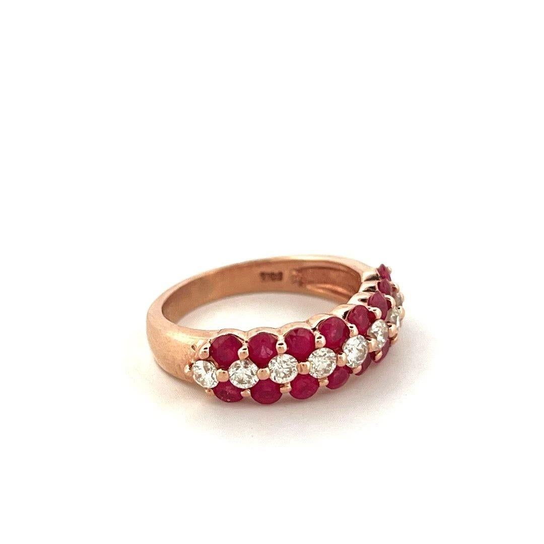 Offered here is a vibrant natural ruby and diamond three-row band ring, crafted in solid 14K rose gold. The ring is stamped 