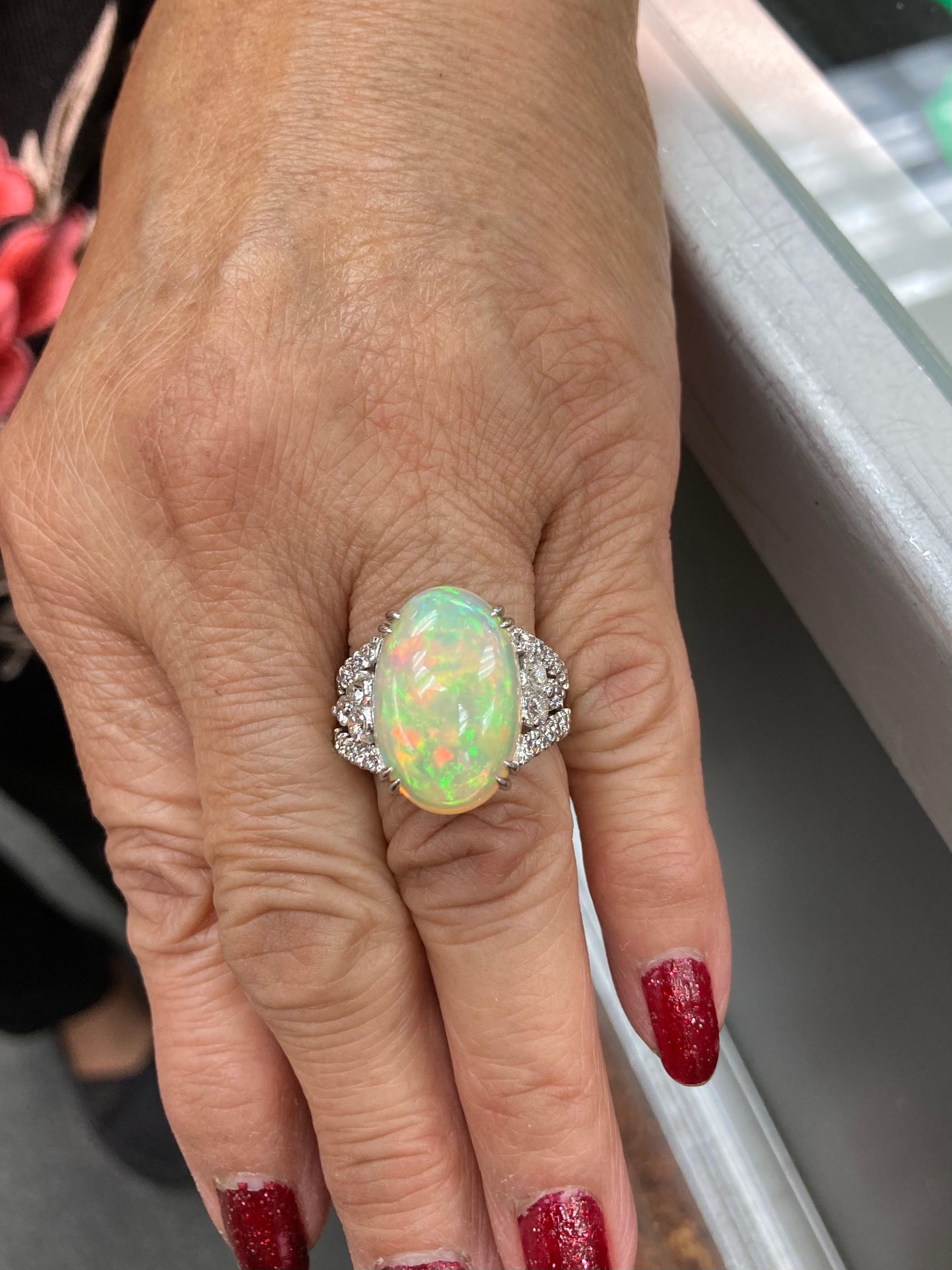 Estate opal diamond and platinum cocktail ring circa 2000.  Love it because it caught your eye, and we are here to connect you with beautiful and affordable jewelry.  Celebrate Yourself!  Simple and concise information you want to know is listed
