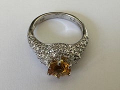 Estate Orange-Yellow Sapphire and Pave Diamond Ring
