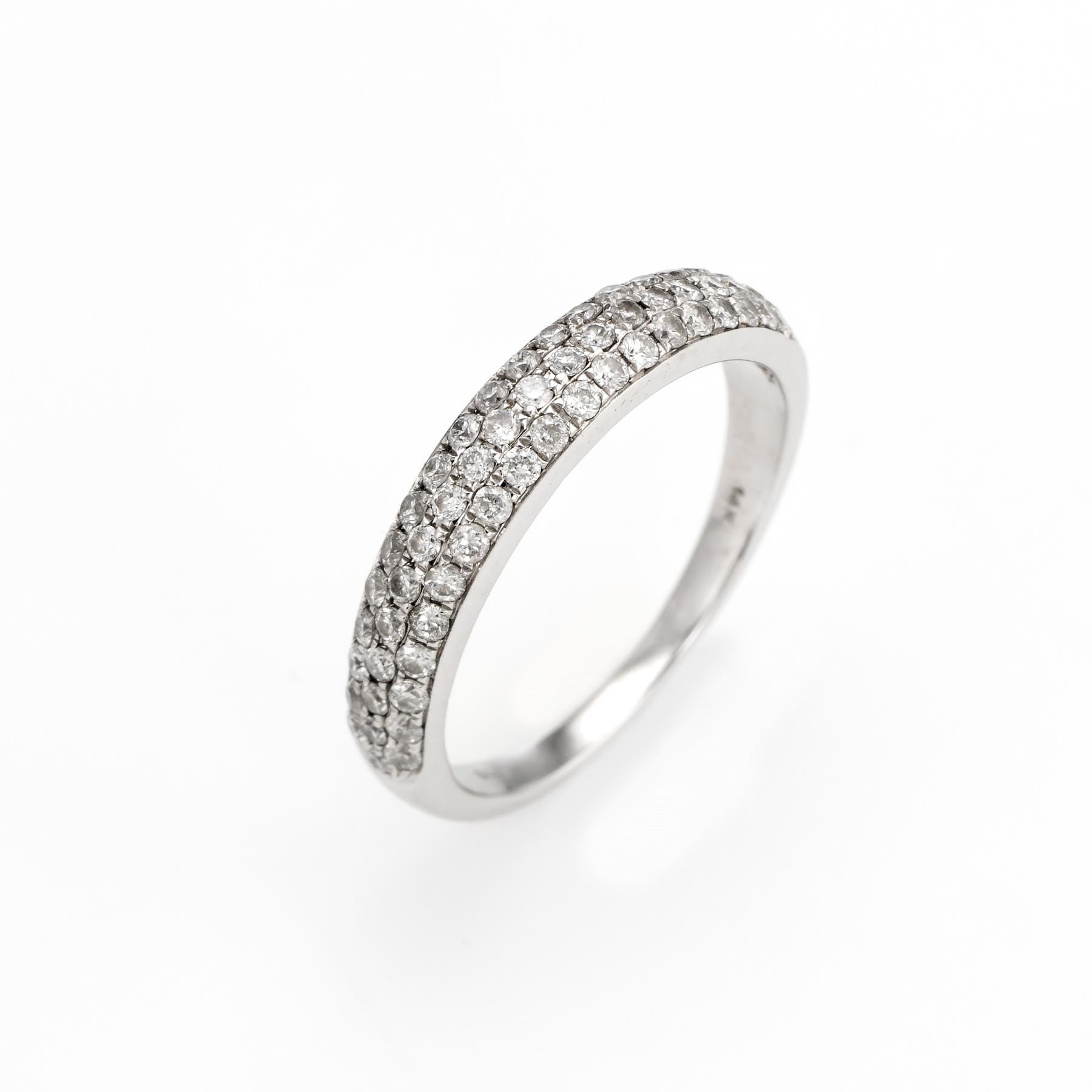 Elegant & stylish pave diamond band, crafted in 14 karat white gold. 

Round brilliant cut diamonds are pave set into the mount and total an estimated 0.60 carats (estimated at I color and SI1-2 clarity). 

The elegant band is pave set with