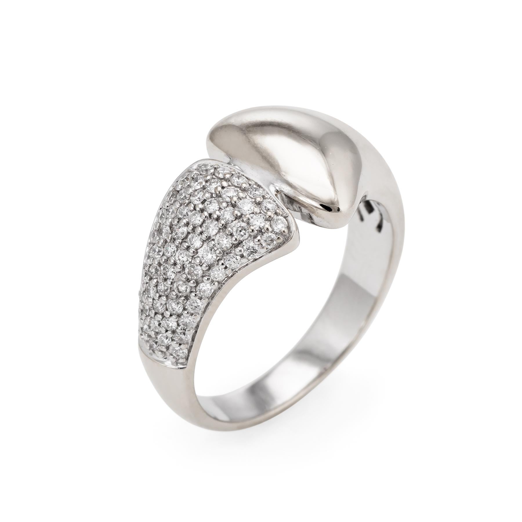 Elegant & stylish pave diamond band, crafted in 14 karat white gold. 

Round brilliant cut diamonds are pave set into the mount and total an estimated 0.50 carats (estimated at I color and SI1-2 clarity). 

The elegant band is pave set with