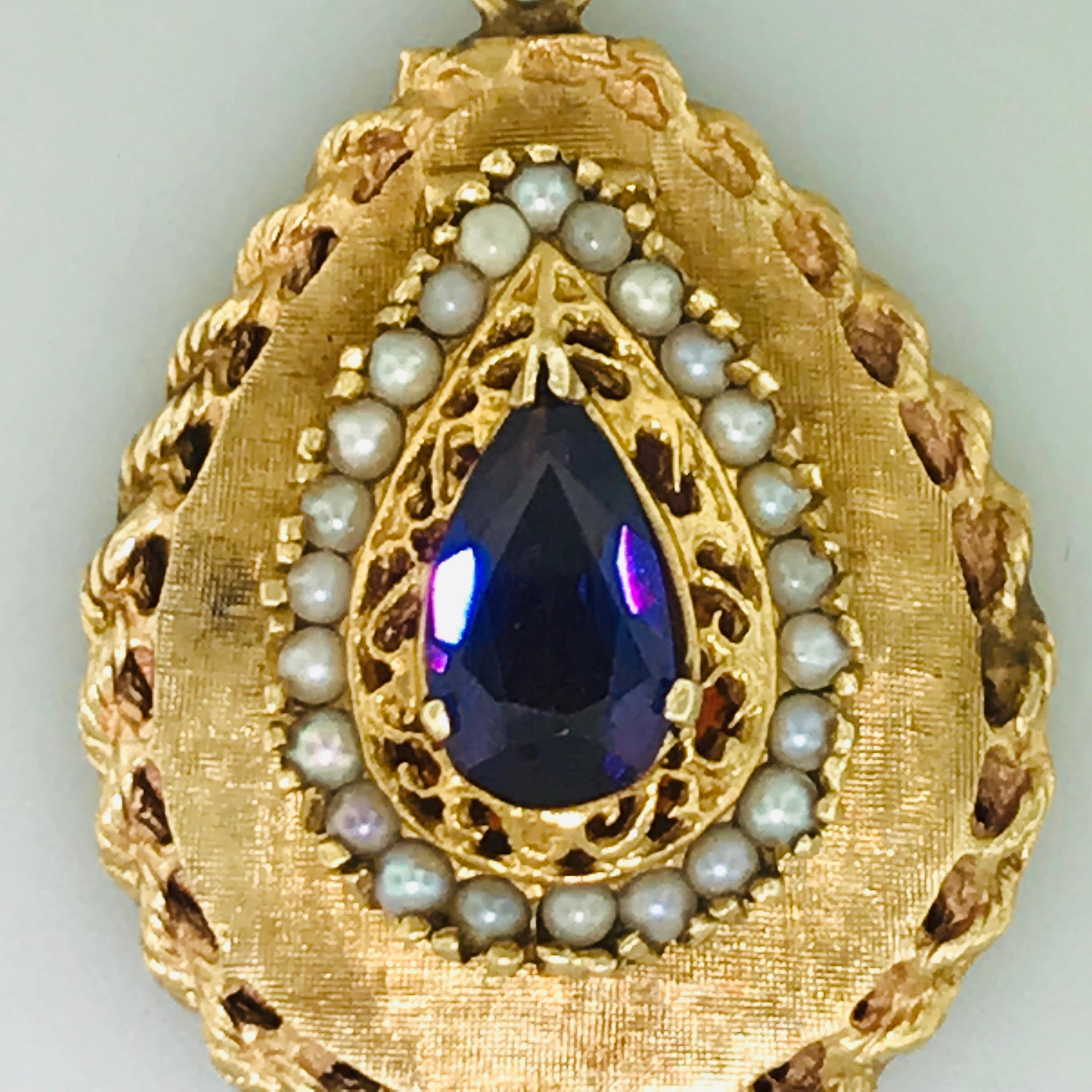 Stunning Amethyst & Pearl Estate Locket-opens from top

This extra-large (XL) locket is unlike any other! With a bright, vibrant purple amethyst in a pear shape, this is an eye-catching estate collection piece. The amethyst is a 12 mm x 7 mm pear