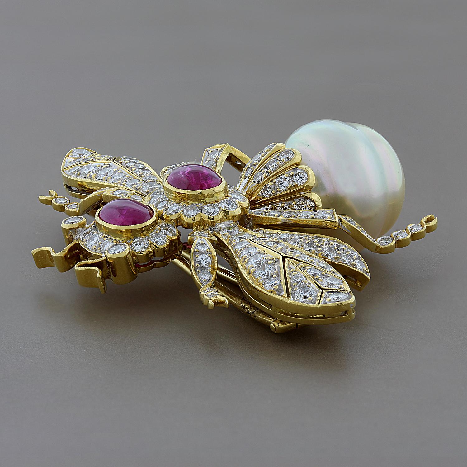 Queen Bee! An exciting estate brooch featuring 2.45 carats of VS quality colorless diamonds and 1.40 carats of cabochon rubies all set in 18K yellow gold. This queen has a fearsome baroque pearl stinger. Catch it if you can.

Brooch Length: 1.45