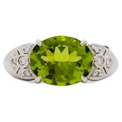 Estate Peridot Oval and Diamond Cocktail Ring in Platinum