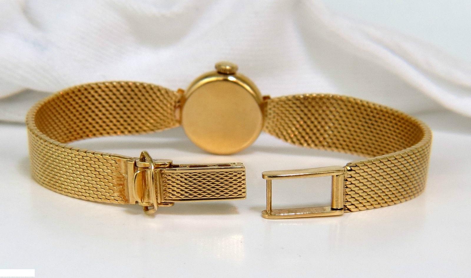 Estate Petite 18 Karat Gublin Swiss Ladies Gold Watch Mesh and Star Bar Dial In Excellent Condition For Sale In New York, NY