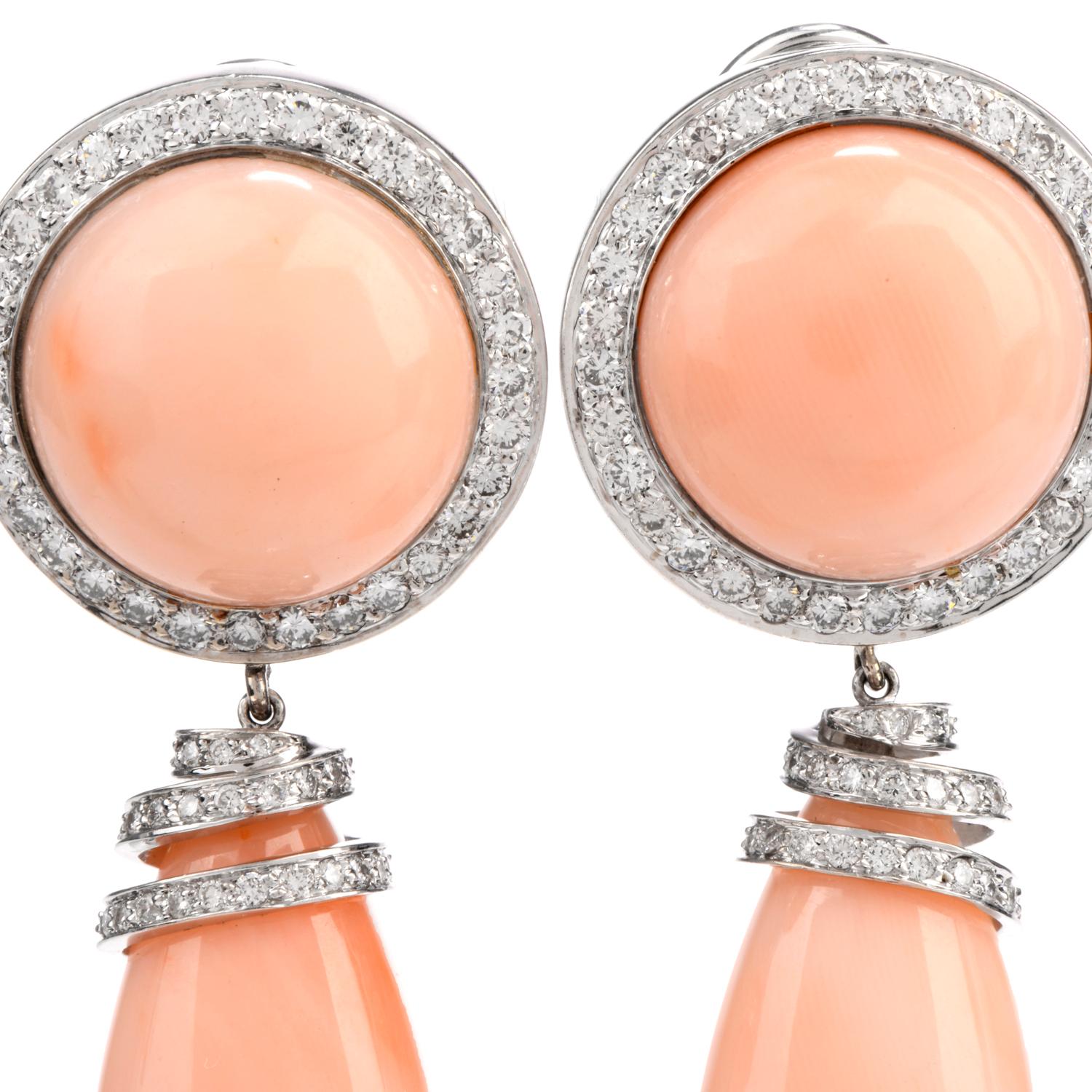  Soft angel hair Pink natural Colored Coral Buttons Clip On to the ear while 

large dangling pear shaped pieces of Coral dangle freely.

Surrounding the round button and creating a whimsical twisting cap are 

contrasting bright white round