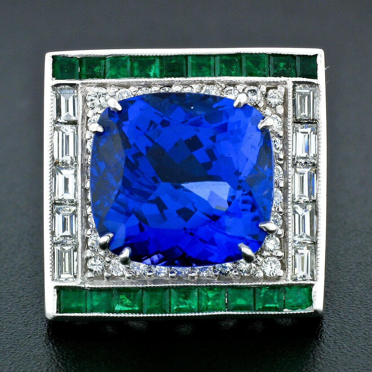 You are looking at a truly fine and breathtaking, GIA certified tanzanite, emerald and diamond cocktail statement ring hand crafted in solid platinum. The ring features a very fine quality tanzanite solitaire with an outstandingly rich royal