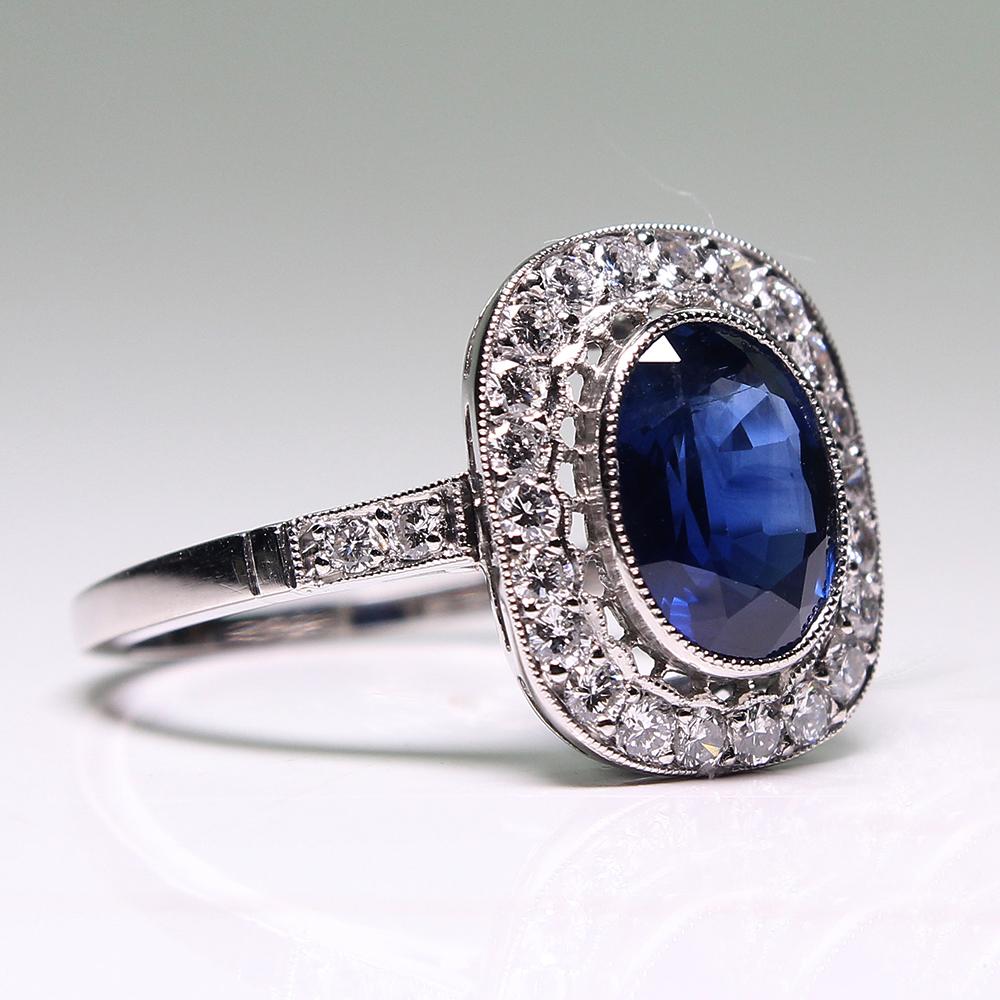 Composition: Platinum
Stones:
•	1 natural oval cut sapphire that weighs 2.30ctw.
•	27 Full cut diamonds of H-VS2 quality that weigh 0.50ctw. 
Rise above finger: 19mm.¬ by 12mm. by 5mm.
Total weight:  4.4grams – 2.8dwt¬¬
This purchase comes with a