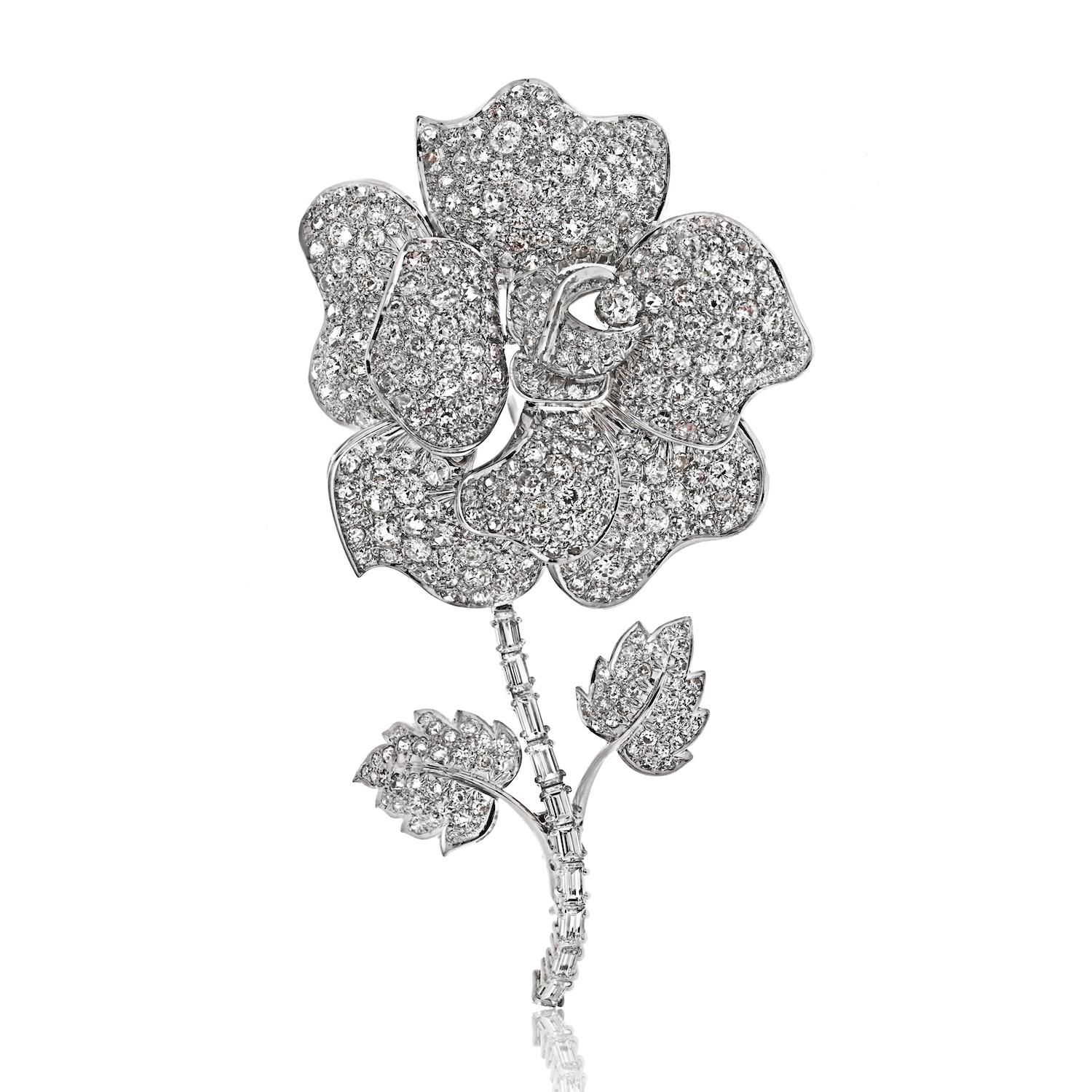 Elevate your jewelry collection with our exquisite Platinum 27 Carat Diamond Rose Flower Brooch. This magnificent piece is a true testament to craftsmanship and elegance. Adorned with over 300 dazzling round diamonds, this brooch captures the