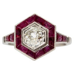Estate Platinum Antique Mine Cut Diamond and Ruby Ring