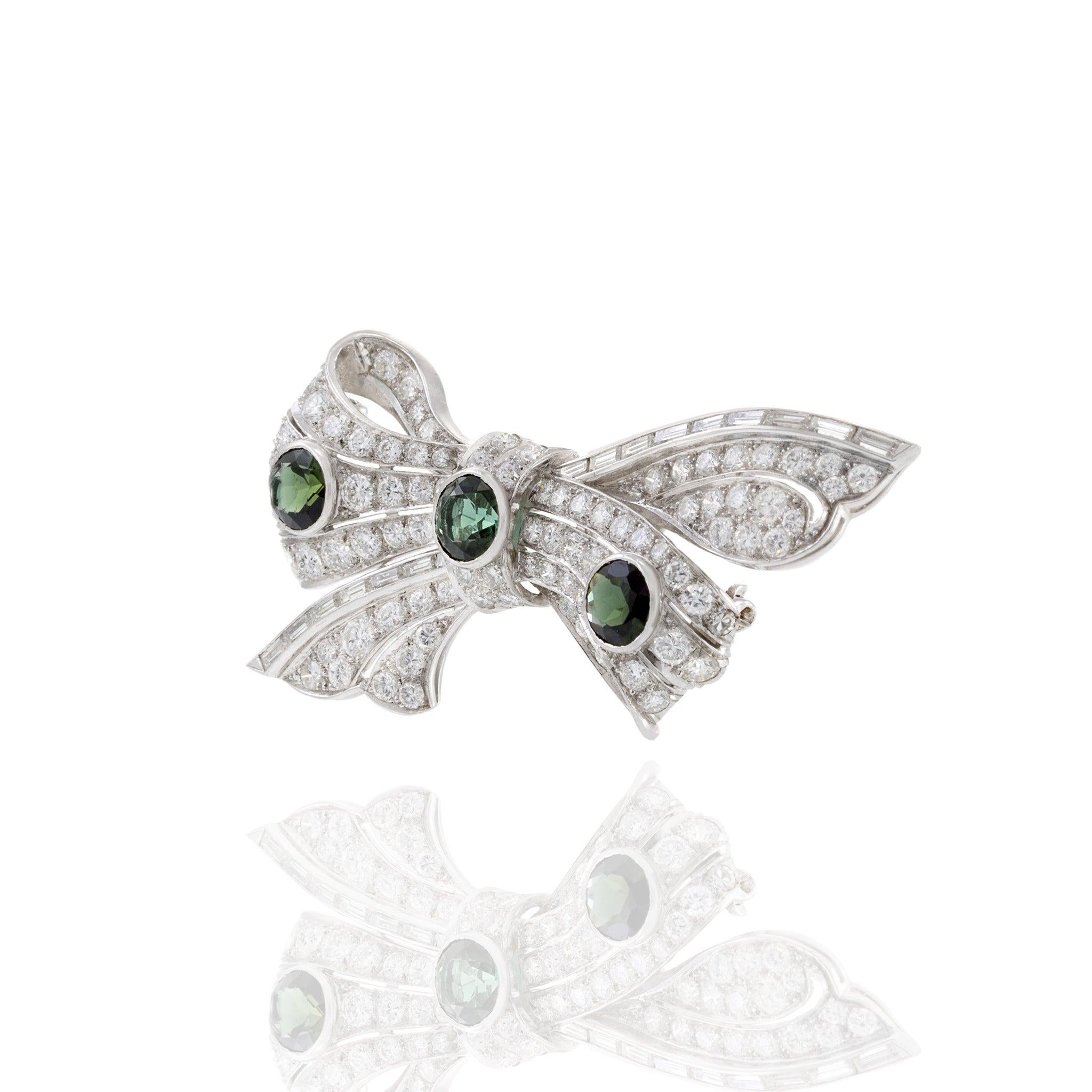 Estate Platinum Art Deco Period Diamond and Garnet Bow Pin In Excellent Condition For Sale In New York, NY