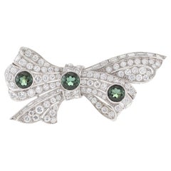 Estate Platinum Art Deco Period Diamond and Garnet Bow Pin