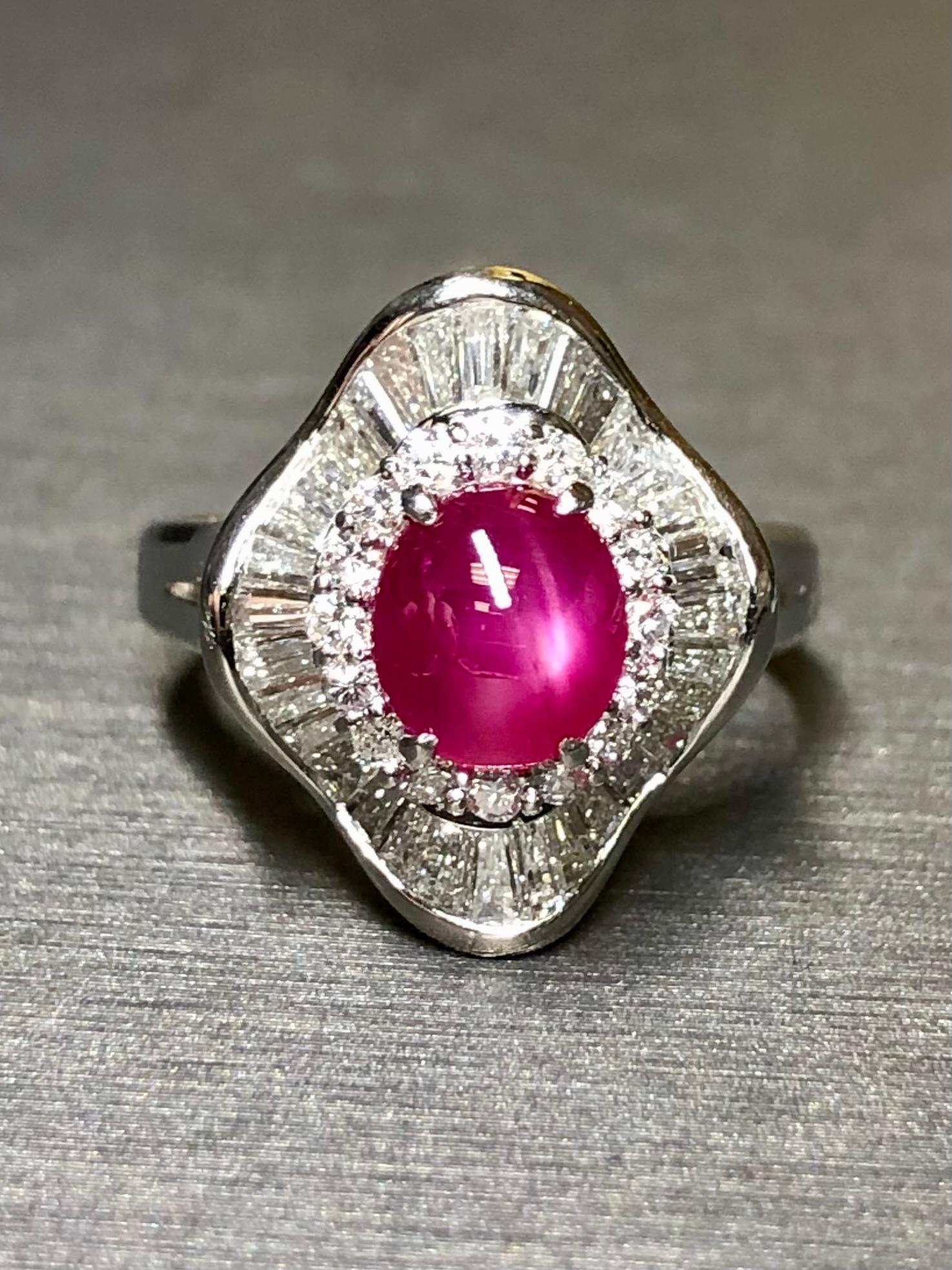 A classic cocktail ring crafted in platinum and centered by an approximately 1.57ct natural star ruby (no heat treatment) surrounded by approximately 1.90cttw in G-I color Vs1-2 clarity baguette and round diamonds.


Dimensions/Weight:

Ring