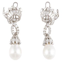 Boucles d'oreilles de succession en platine, perles de culture des mers du Sud et diamants