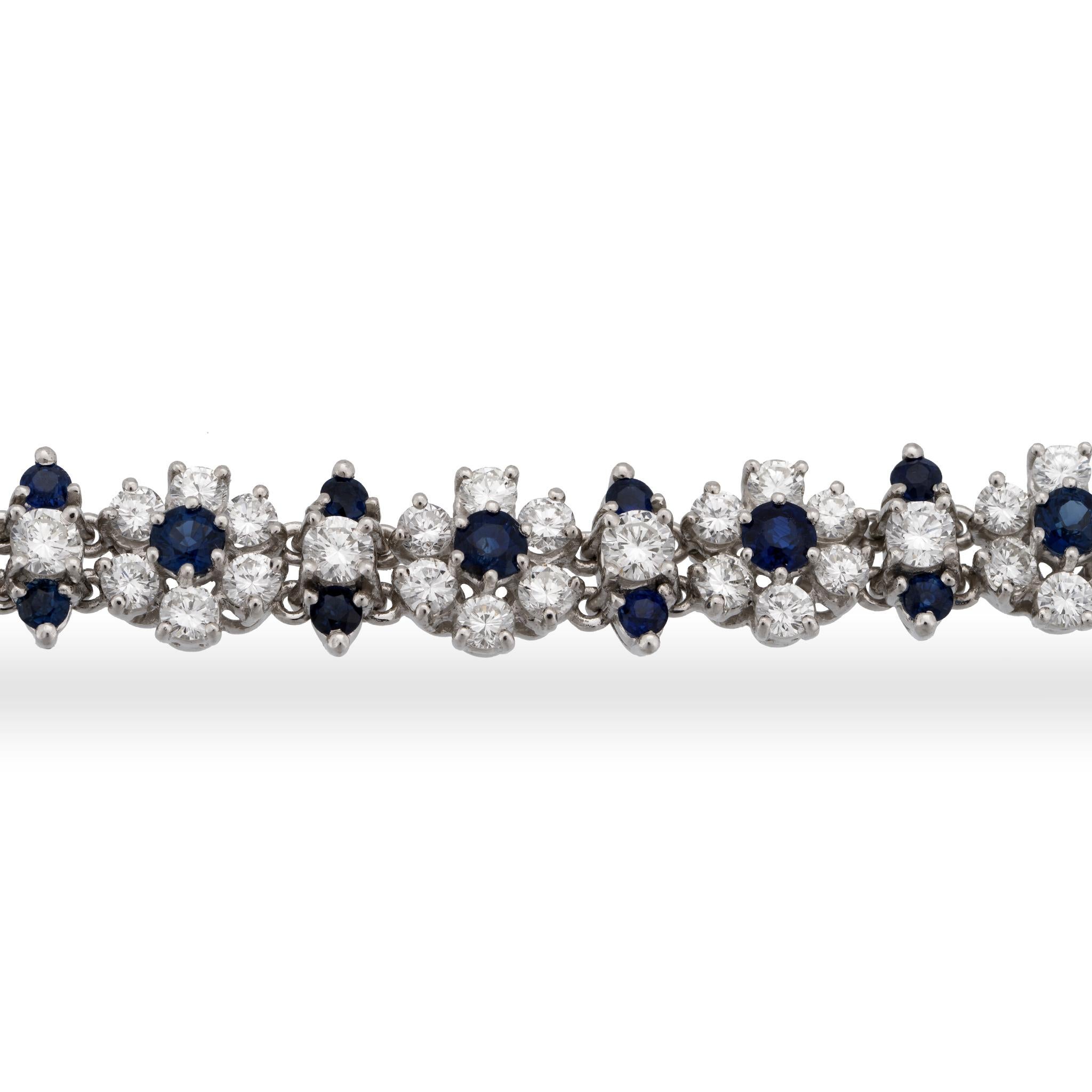 Estate Platinum Diamond and Sapphire Flower Bracelet In New Condition In New York, NY
