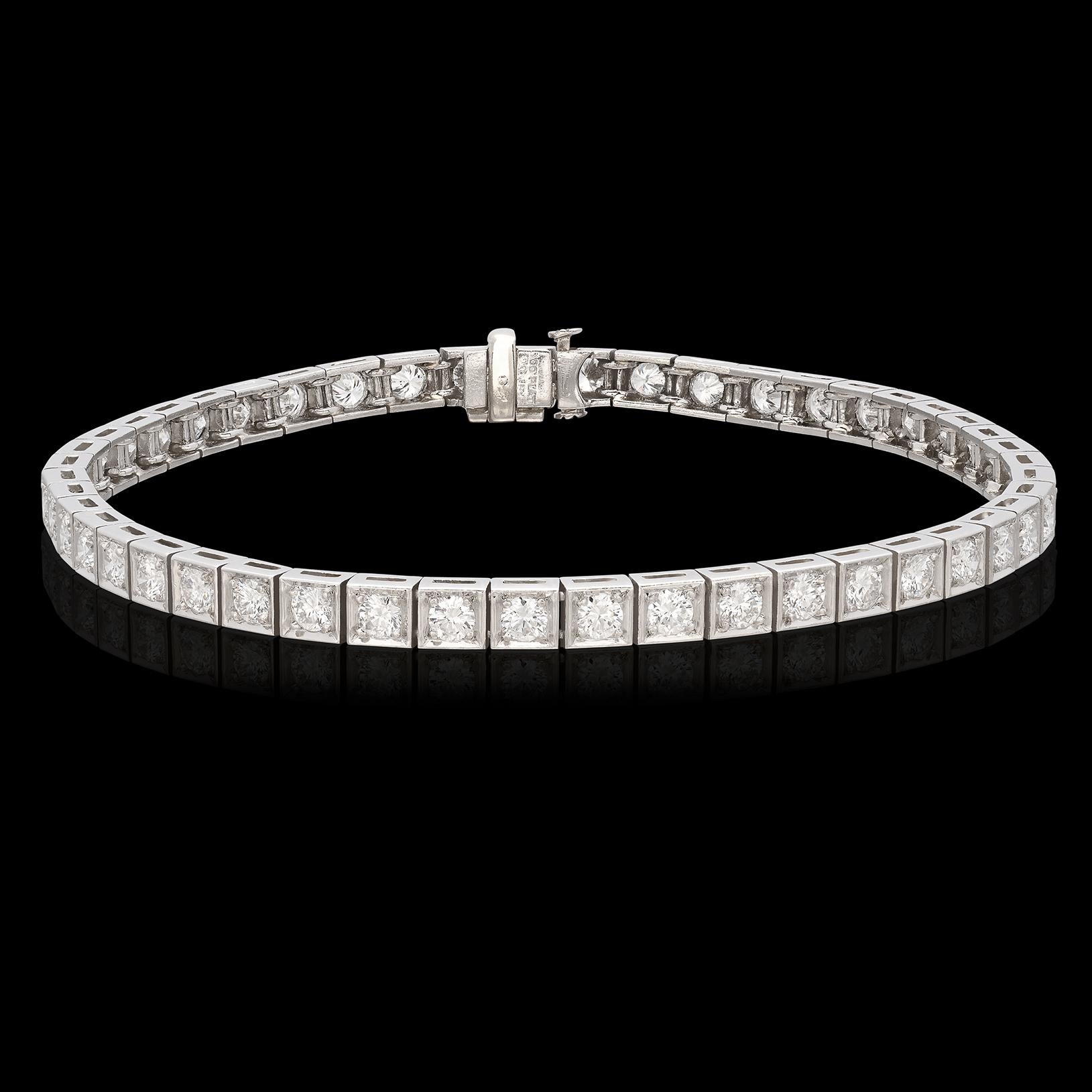 Some things really do get better with age. This stunning diamond line bracelet features 47 round cut diamonds set in individual square platinum settings for a total carat weight of 3.76 carats, giving this piece a classic geometric look reminiscent