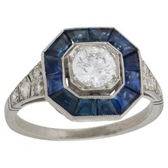 Anello di fidanzamento in platino con diamanti e zaffiri da 0,60 carati